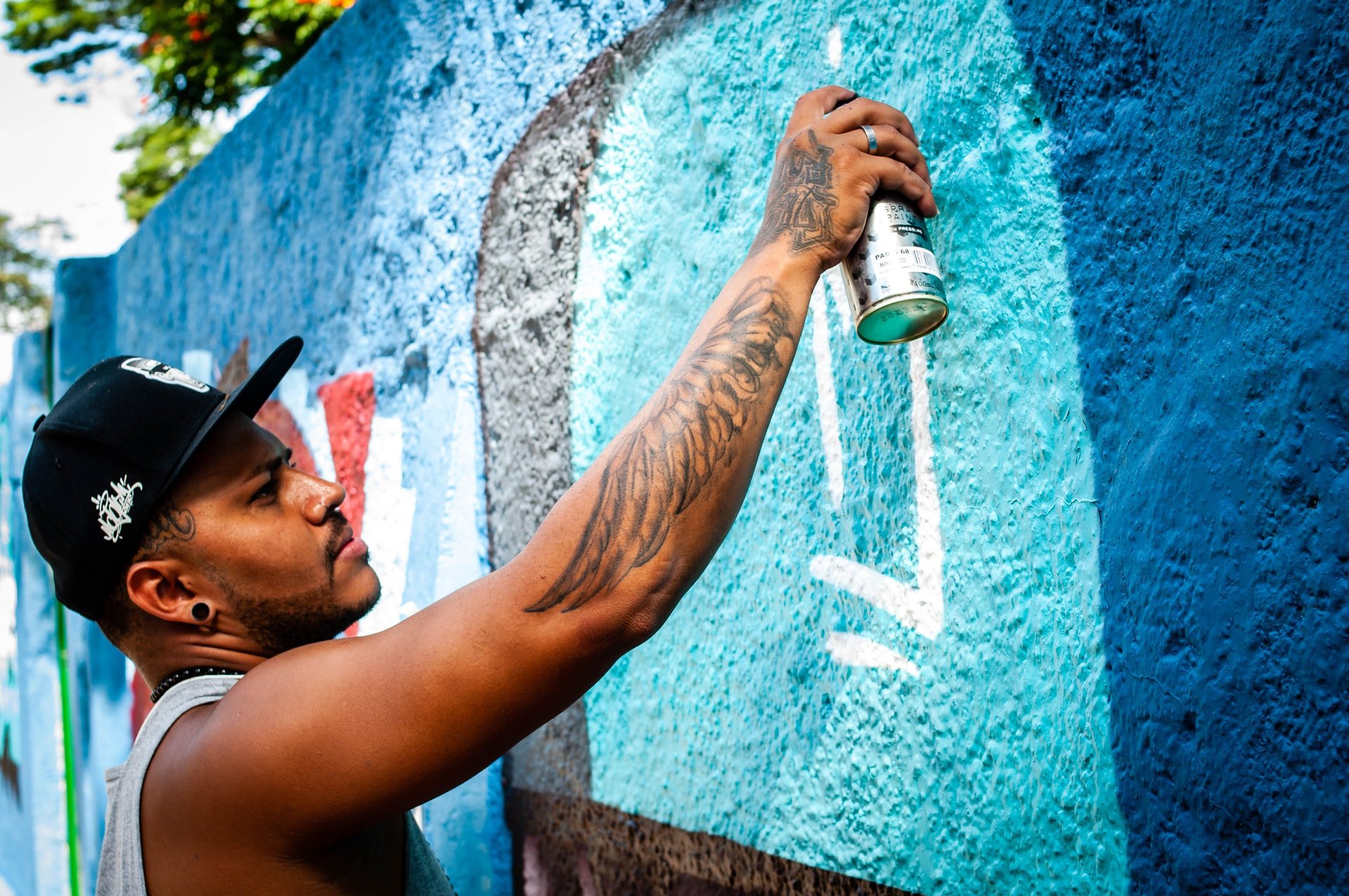 an abstract photo of a curved building with a blue sky in the background