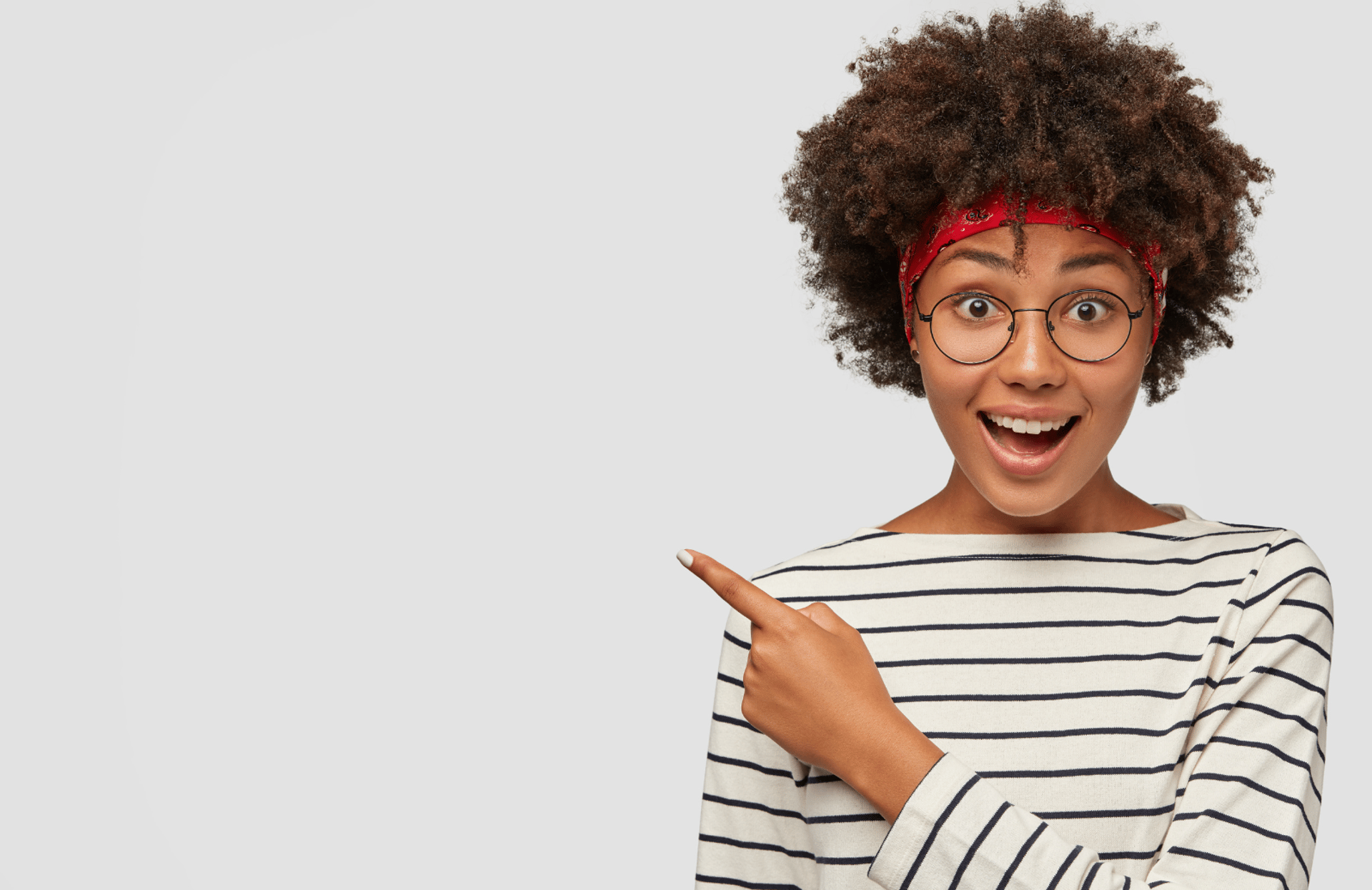 an abstract photo of a curved building with a blue sky in the background