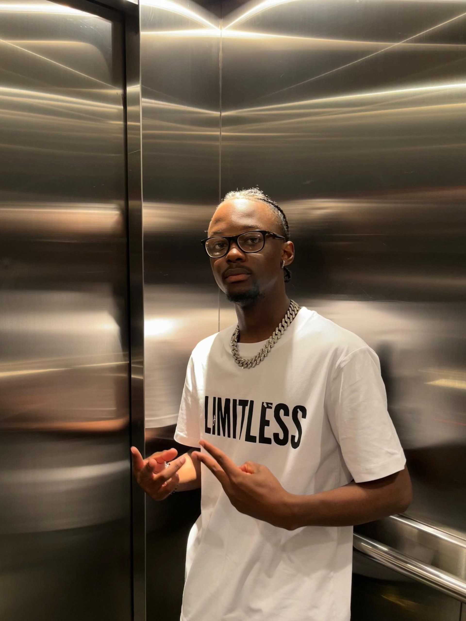 woman wearing yellow long-sleeved dress under white clouds and blue sky during daytime