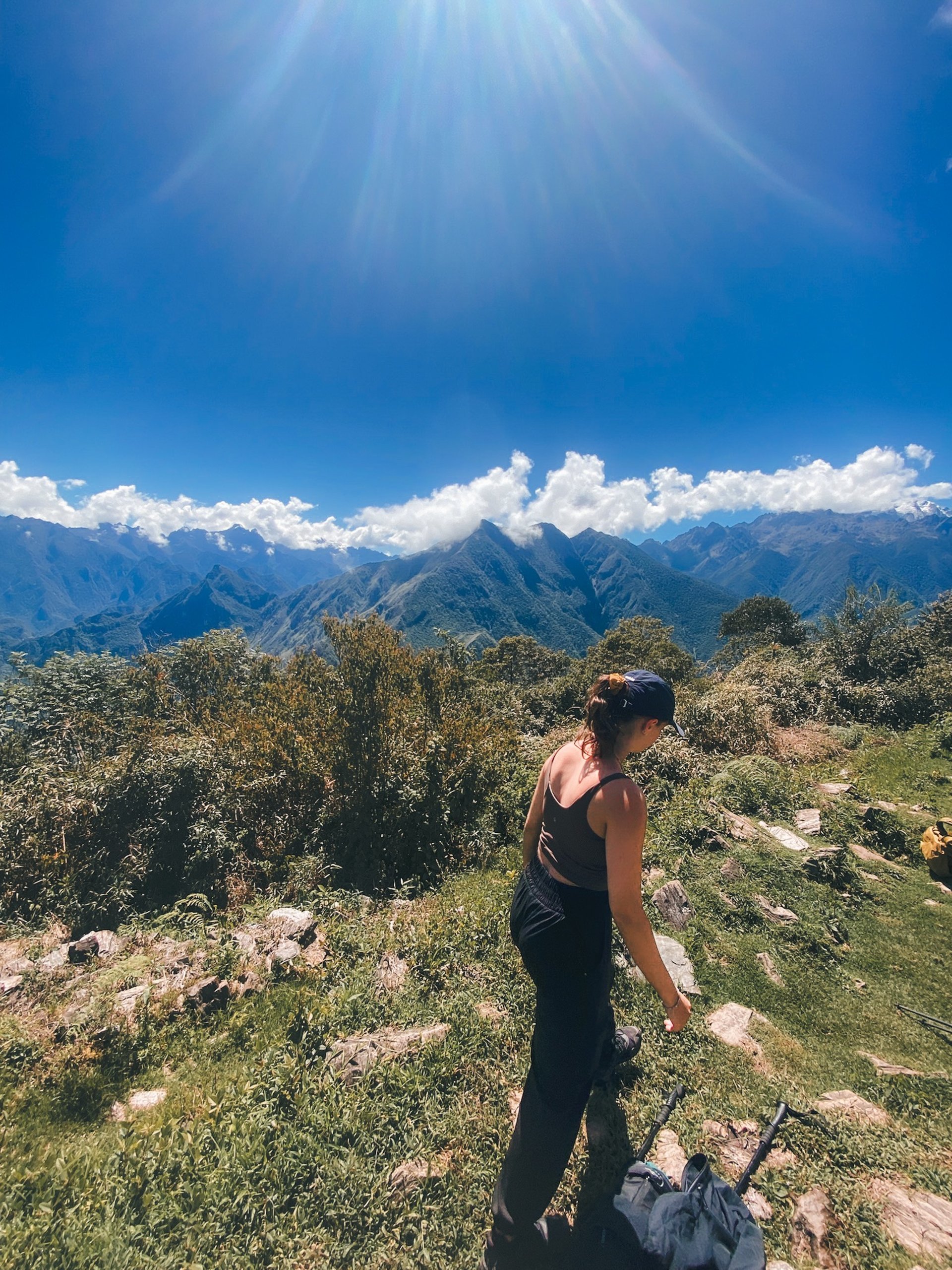 Girl walking Inca trail Llactapata