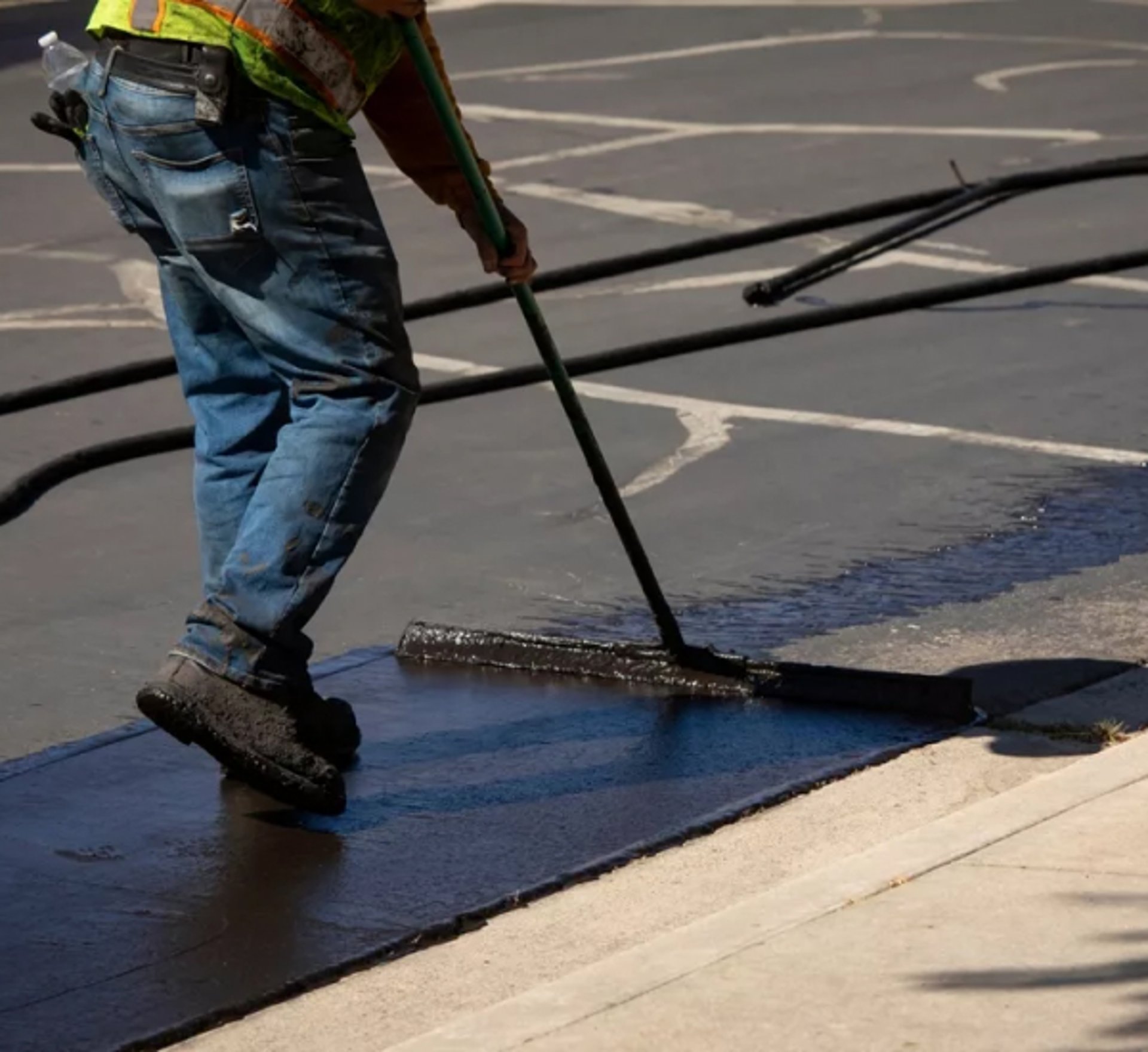 Seal Coating a Driveway in Lee County, AL