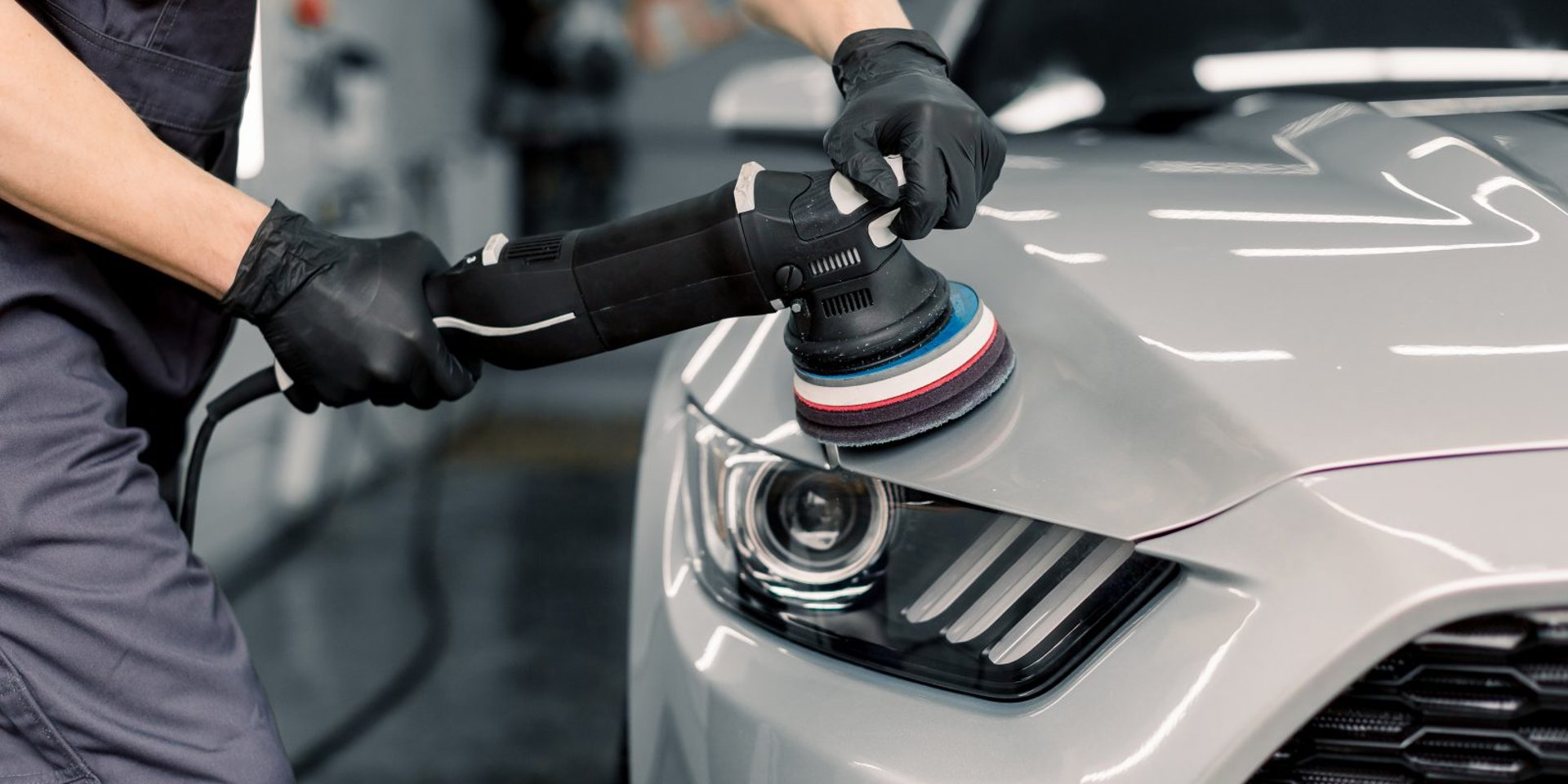 an abstract photo of a curved building with a blue sky in the background