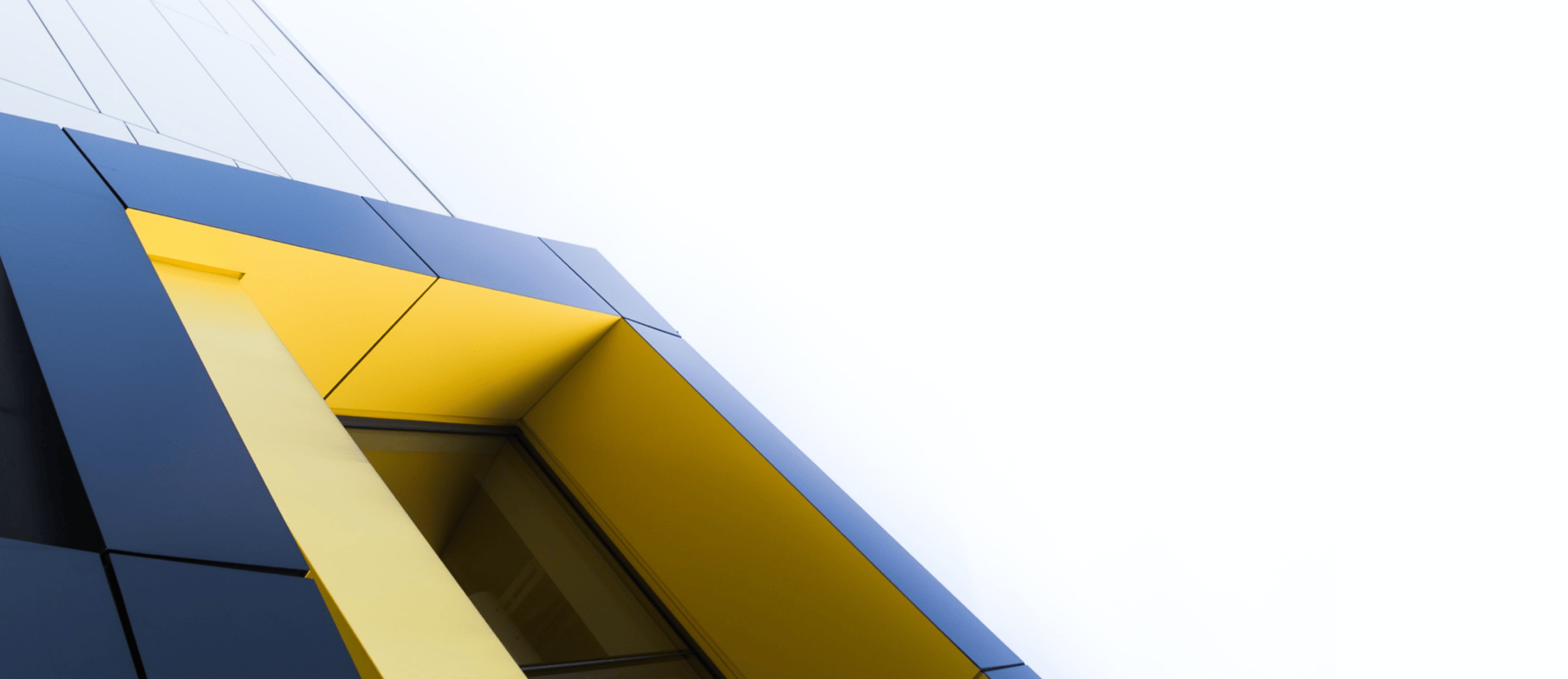 glass building under clear blue sky