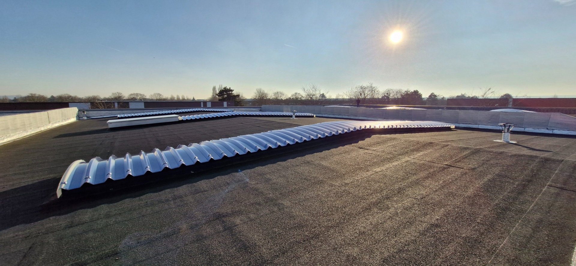 woman wearing yellow long-sleeved dress under white clouds and blue sky during daytime