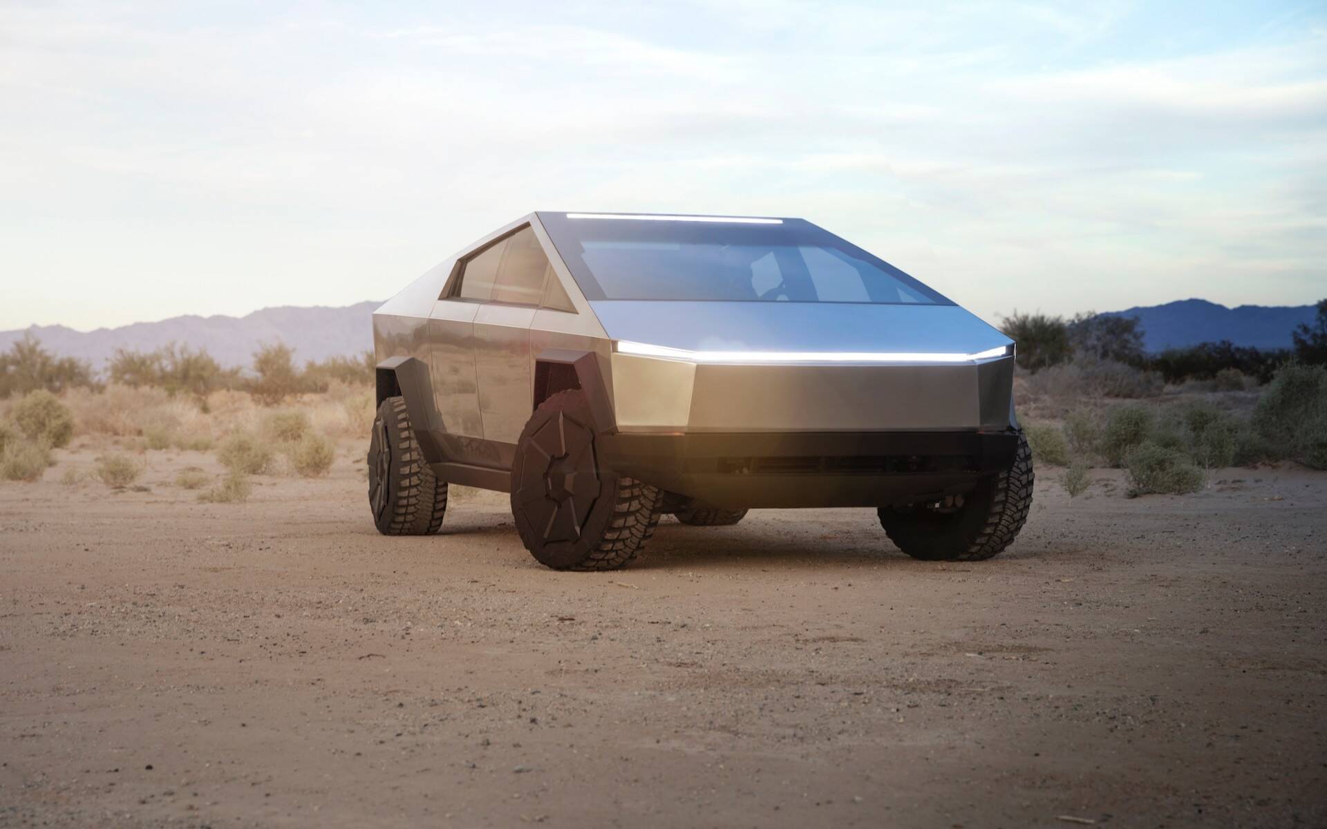 a futuristic car is parked on a cobblestone street