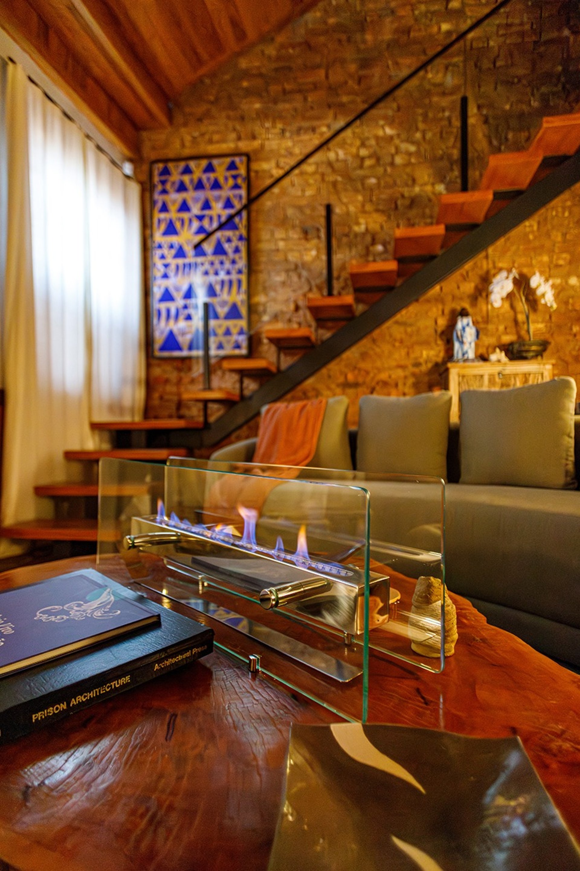 black and brown leather padded tub sofa