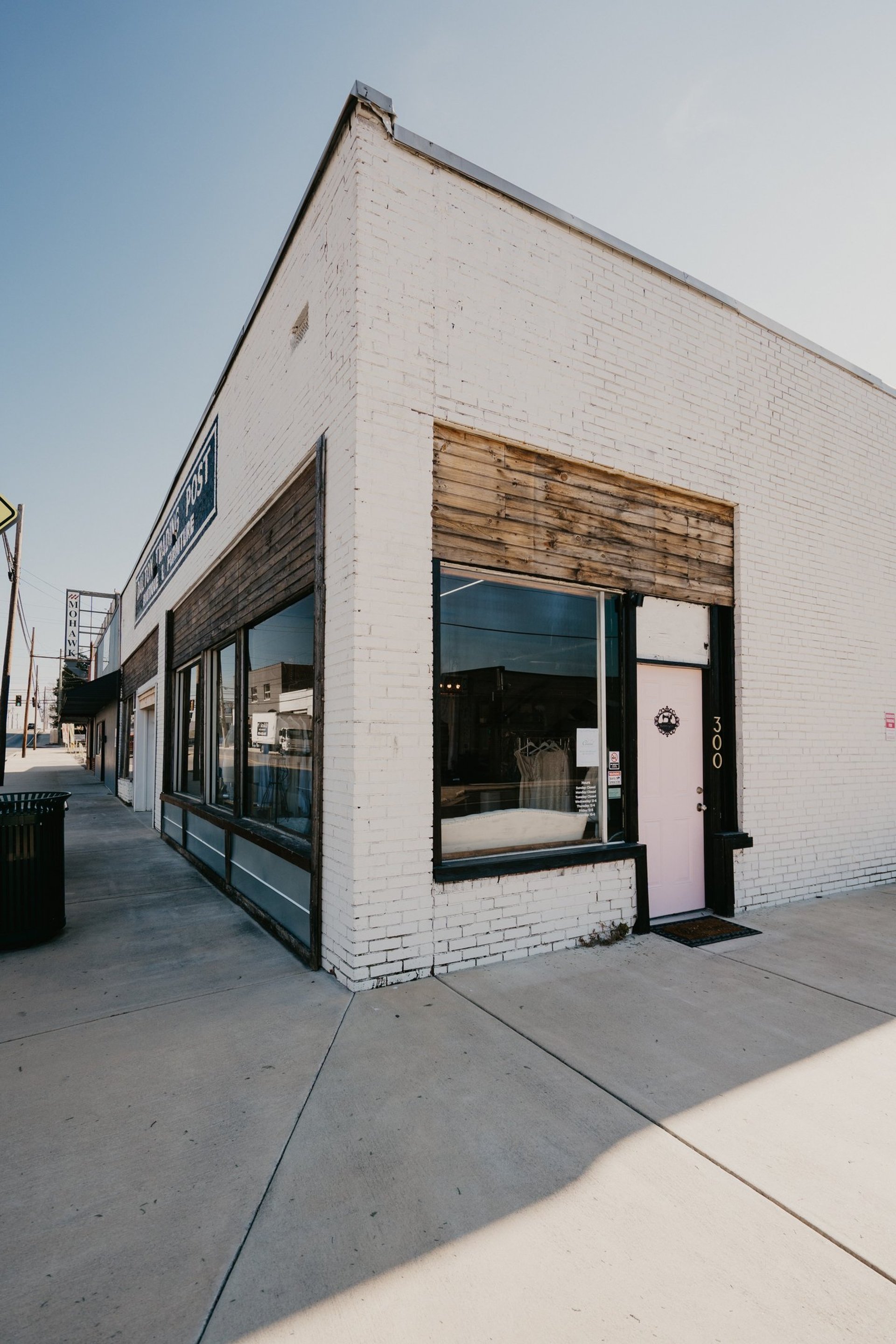 woman wearing yellow long-sleeved dress under white clouds and blue sky during daytime
