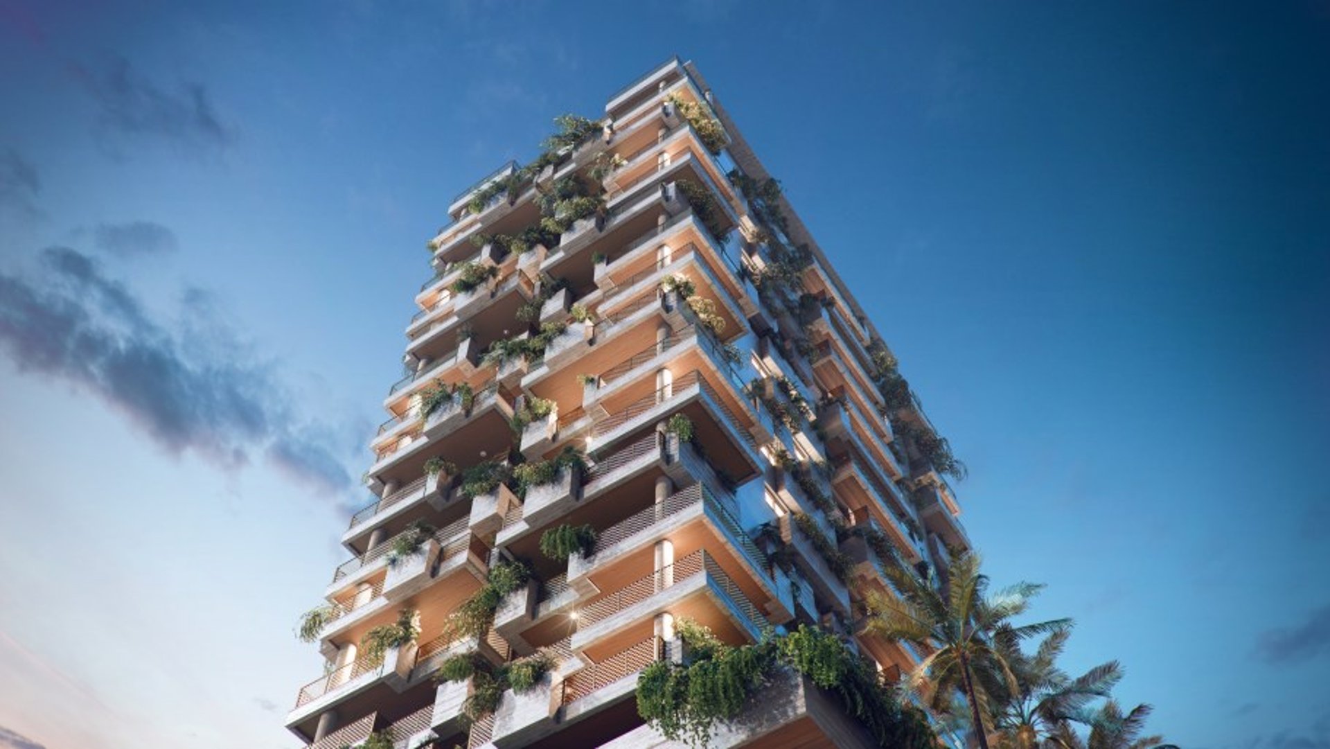 a woman sitting at a table writing on a piece of paper