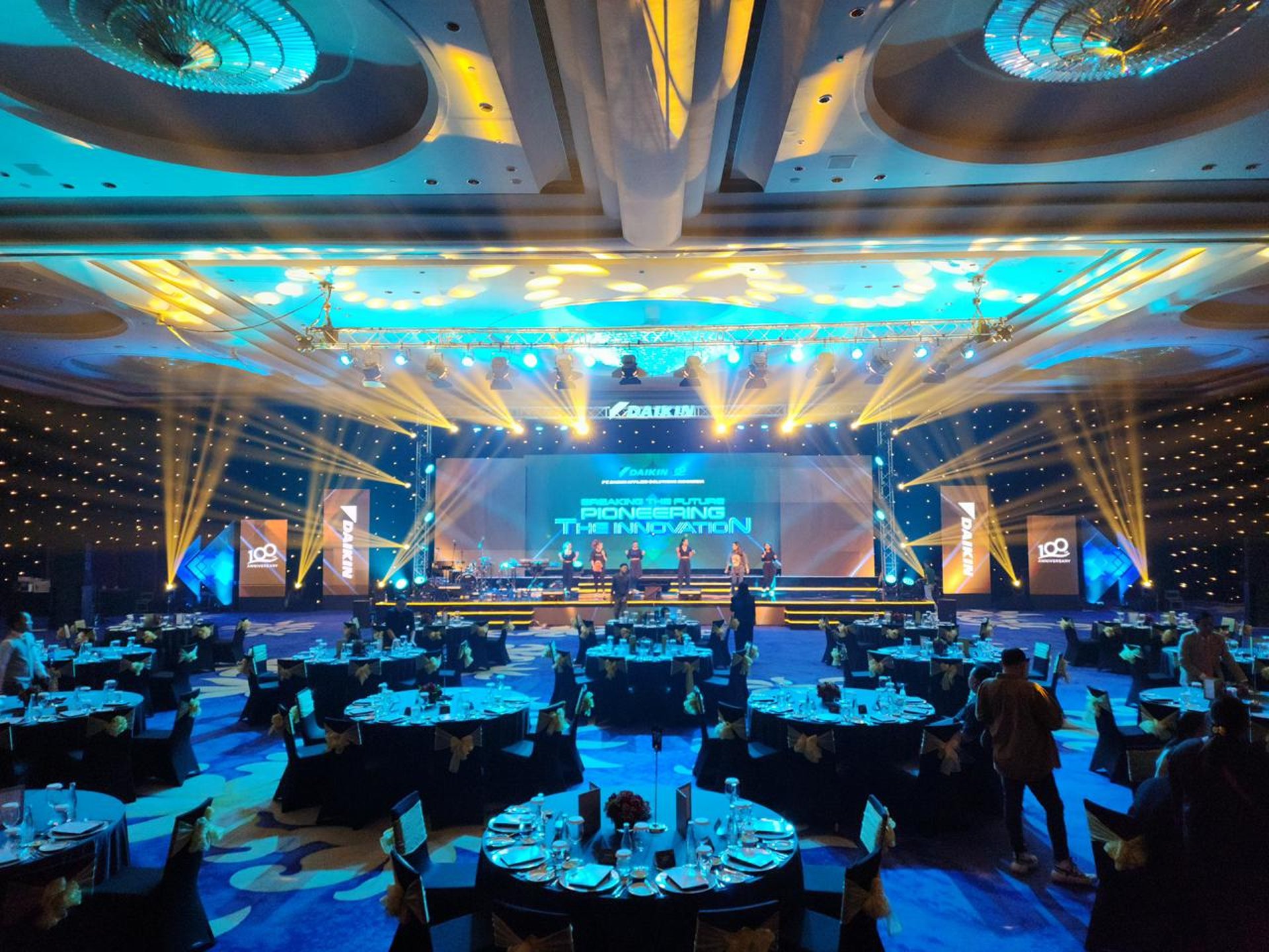 woman wearing yellow long-sleeved dress under white clouds and blue sky during daytime