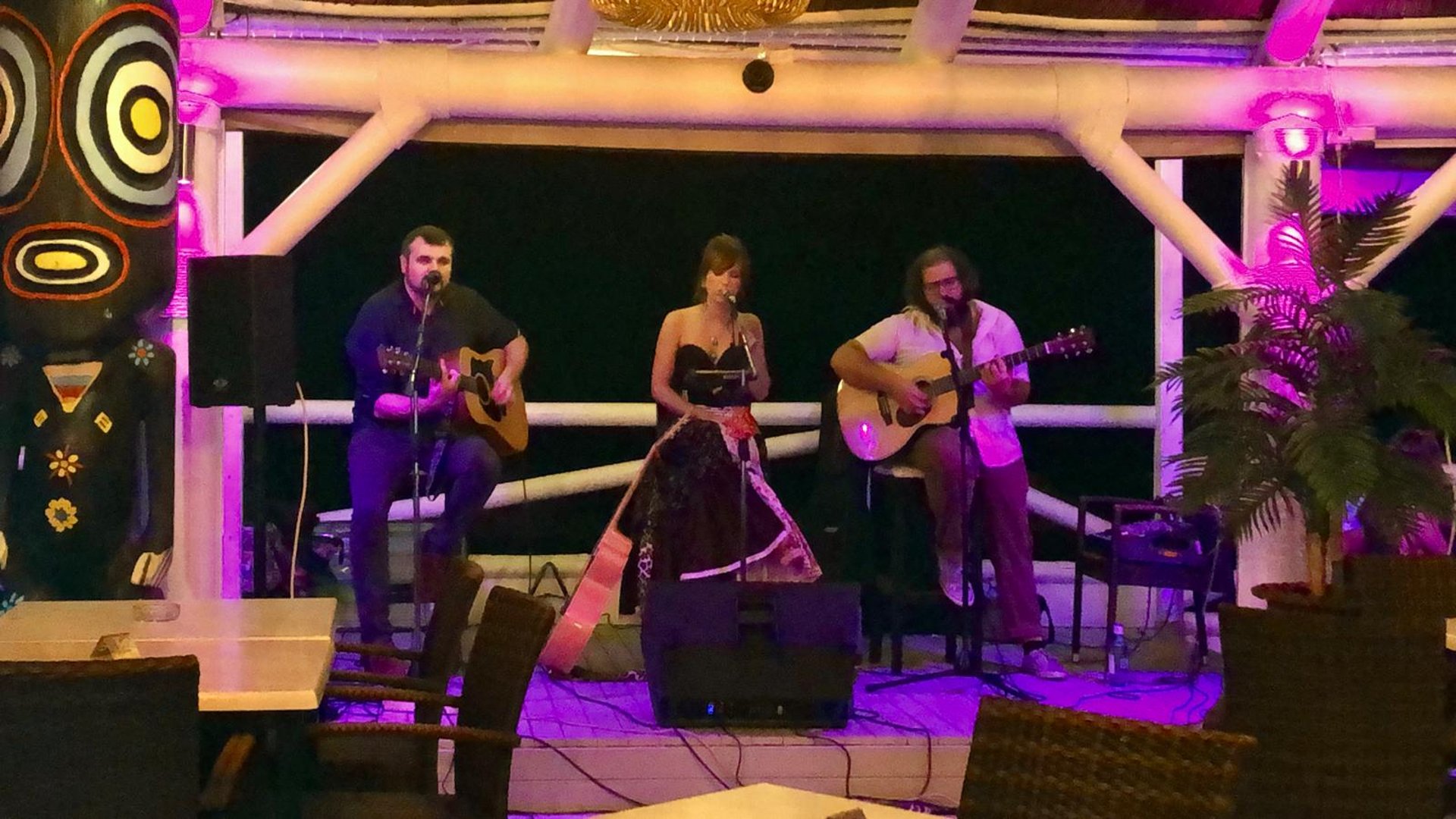 an abstract photo of a curved building with a blue sky in the background