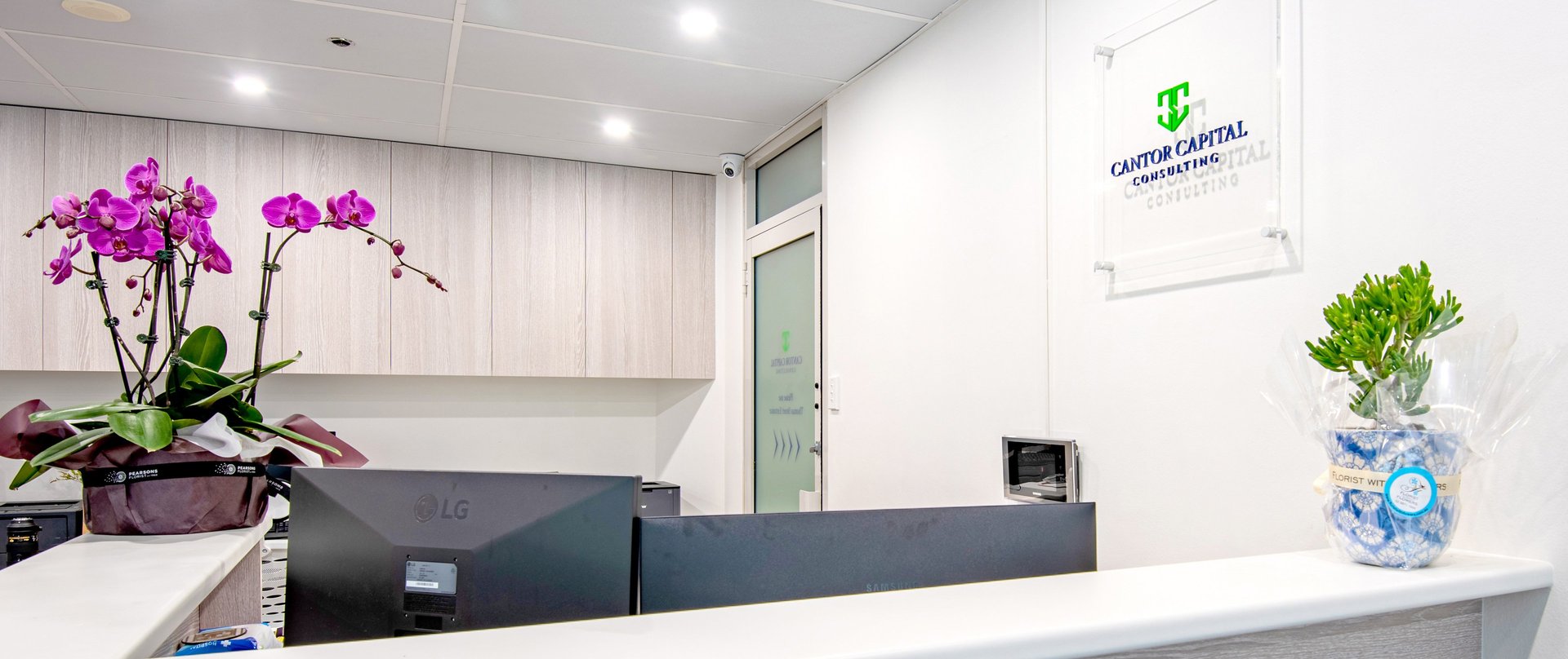 an abstract photo of a curved building with a blue sky in the background