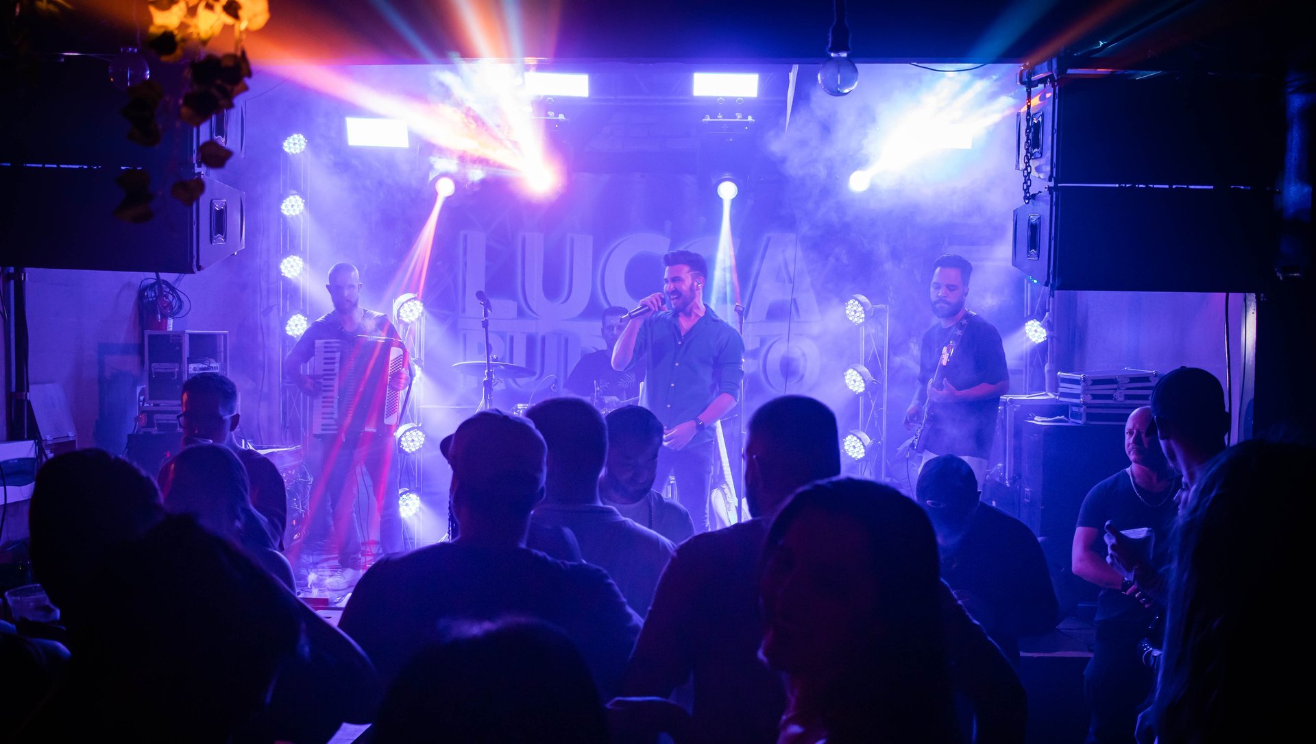 black and brown leather padded tub sofa