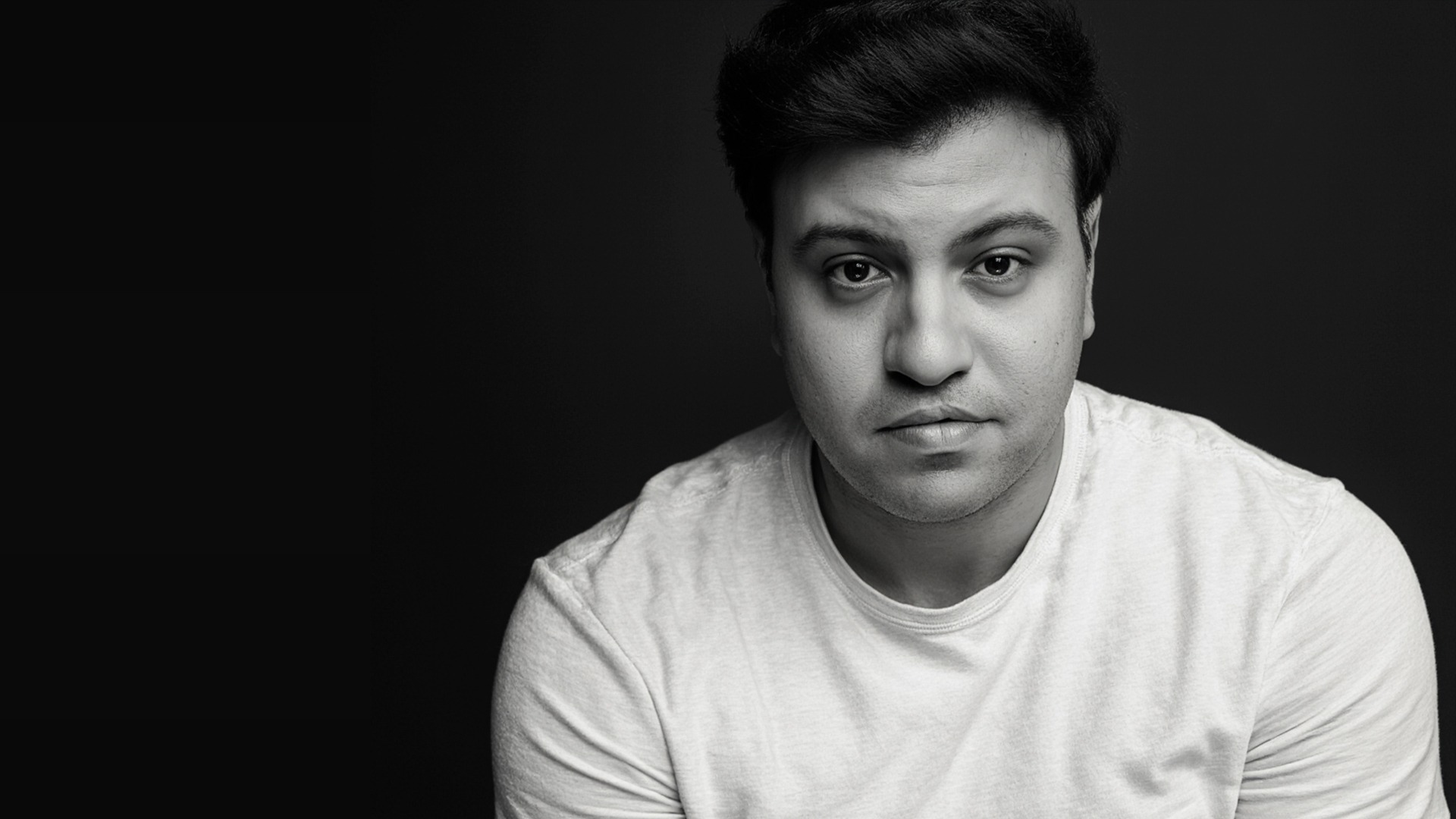 black and brown leather padded tub sofa