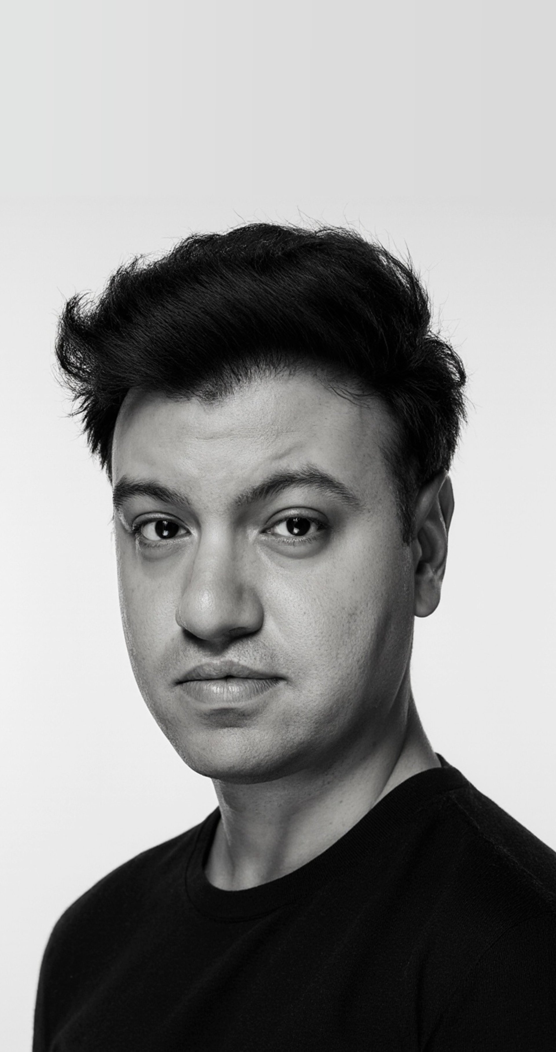 black and brown leather padded tub sofa