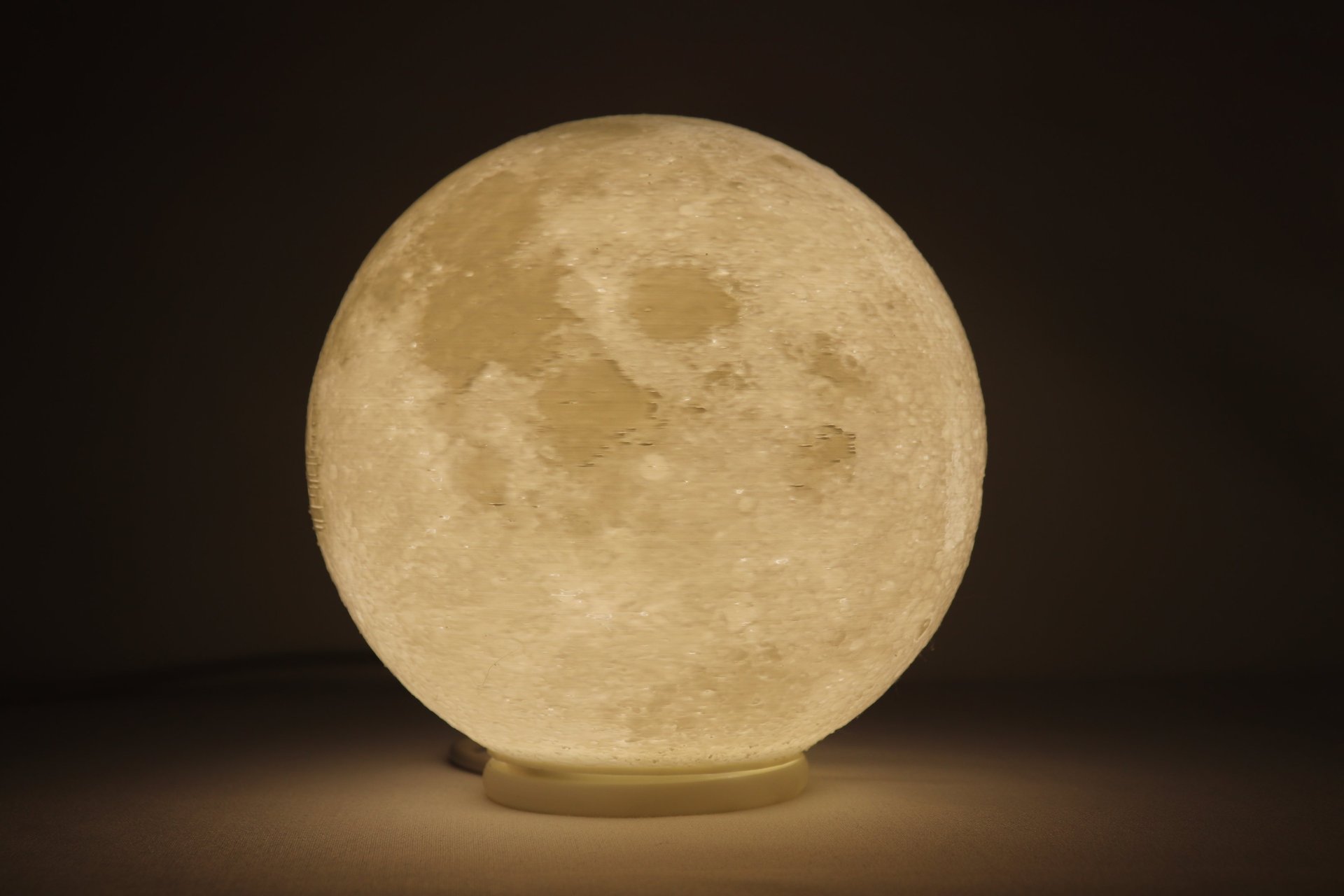 person wearing grey knit sweater