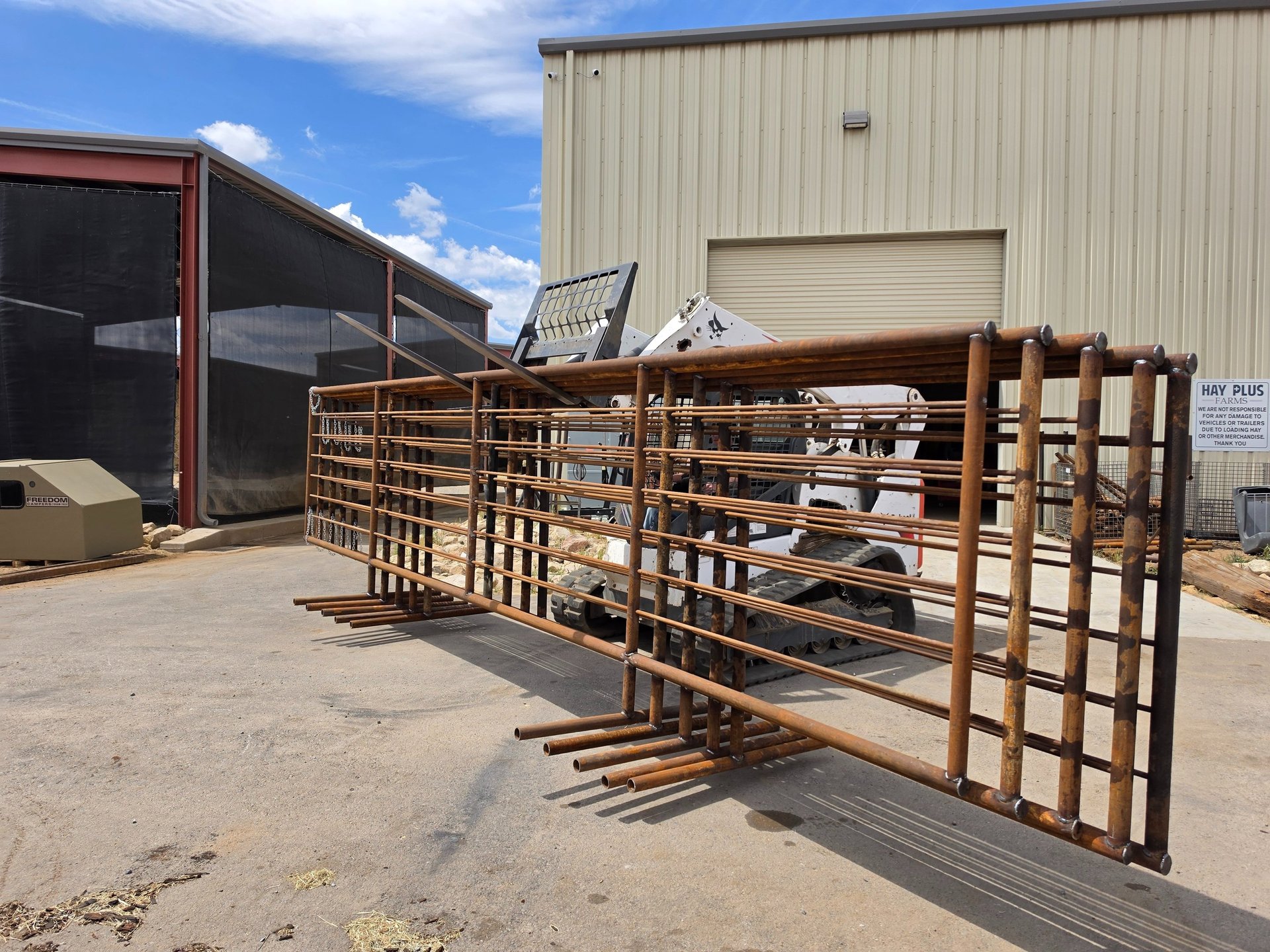 an abstract photo of a curved building with a blue sky in the background
