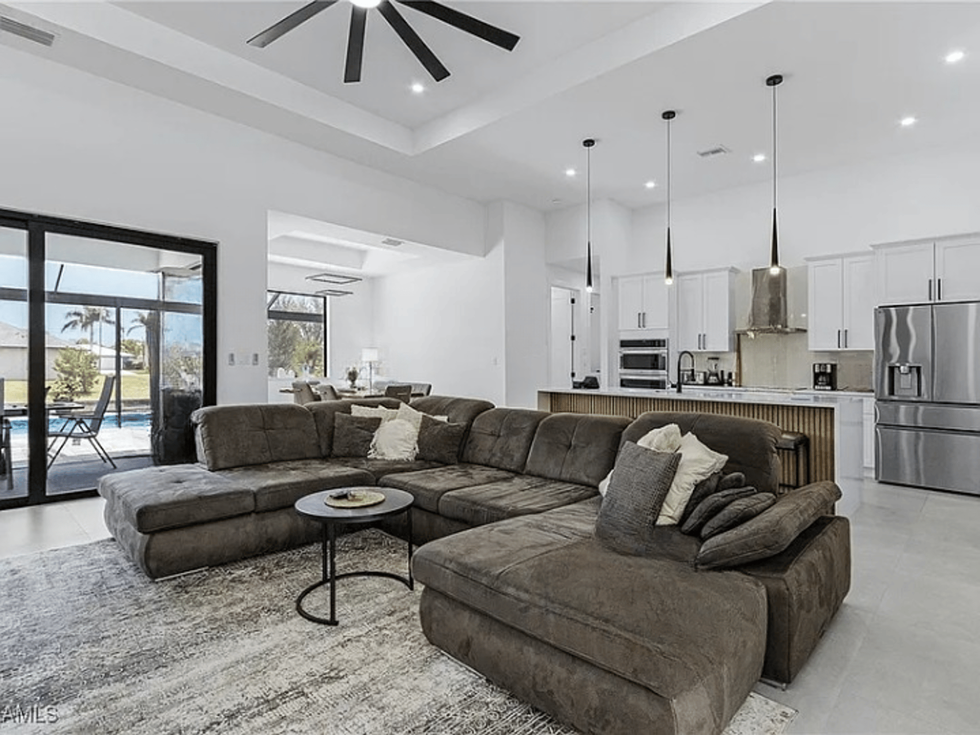 black and brown leather padded tub sofa