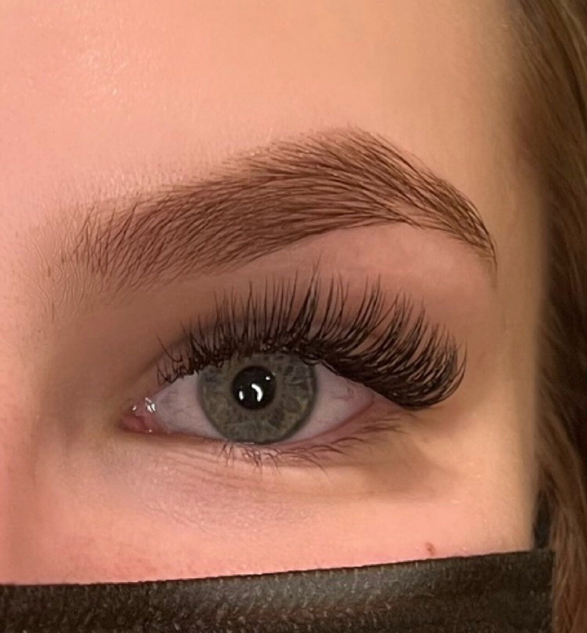 black and brown leather padded tub sofa