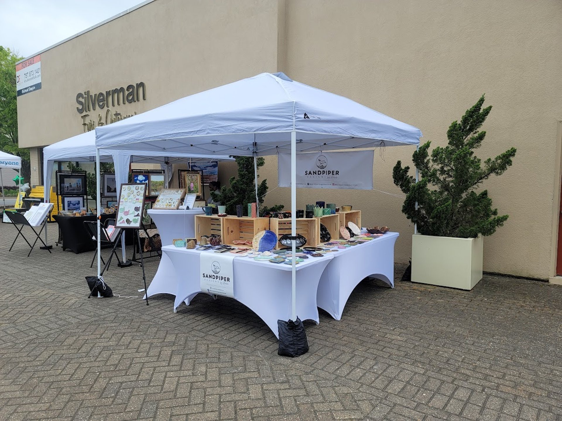 an abstract photo of a curved building with a blue sky in the background