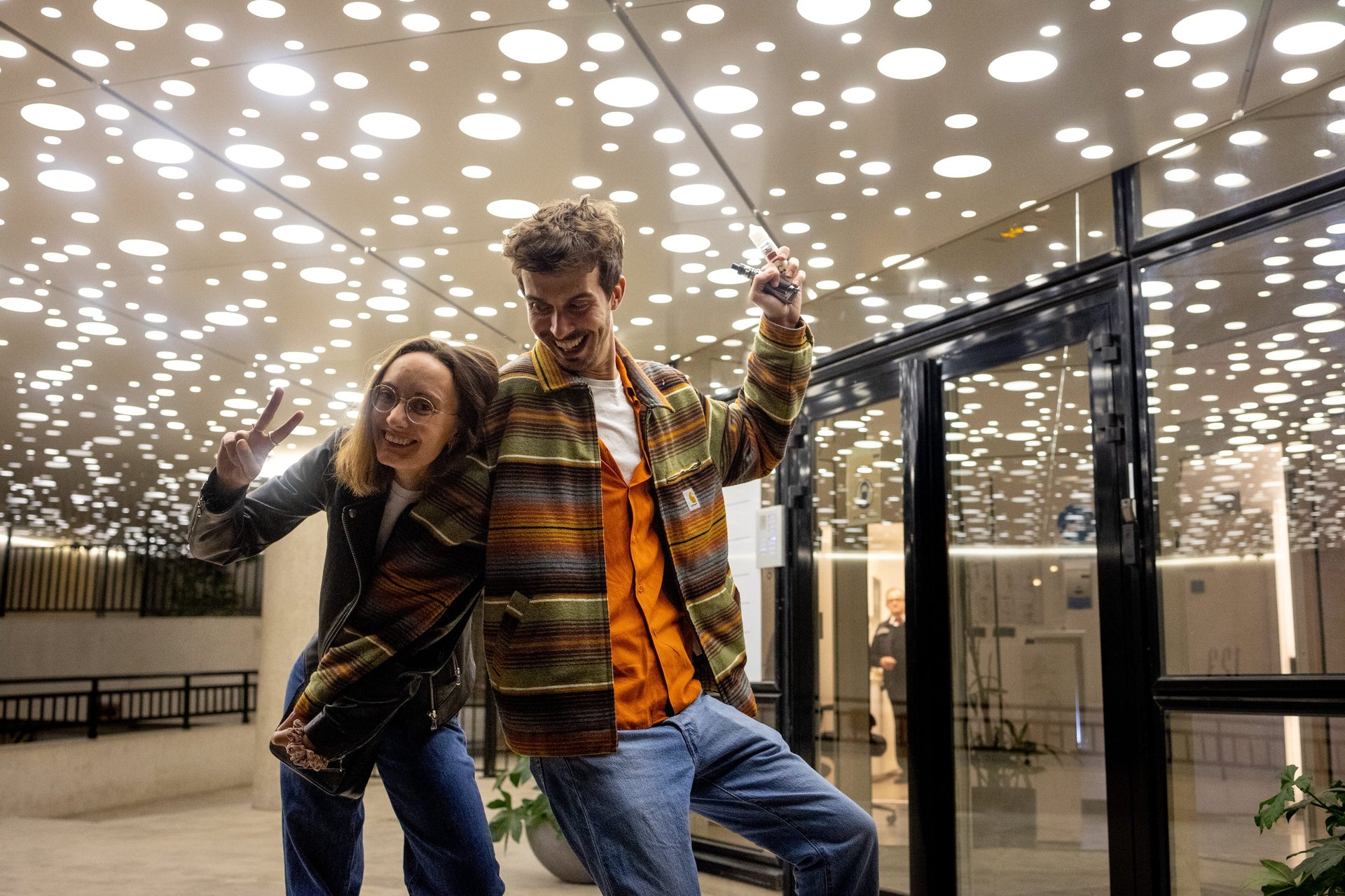 couple wearing silver-colored rings