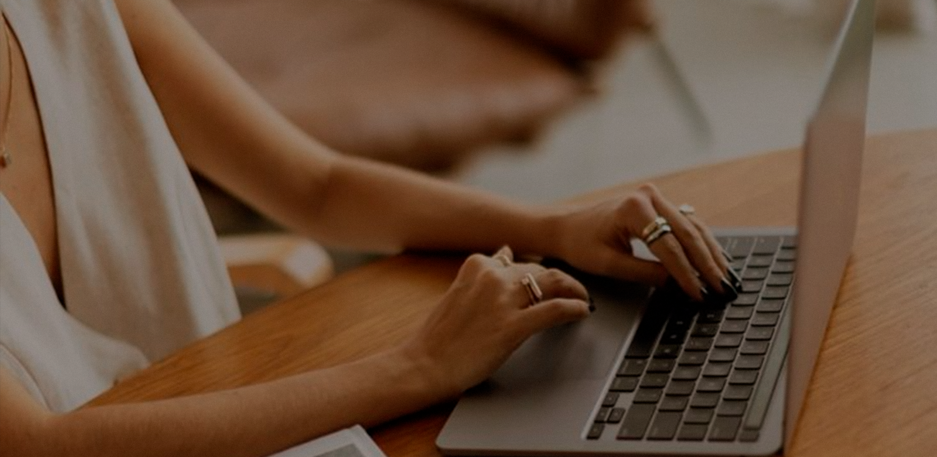 MacBook Pro near white open book