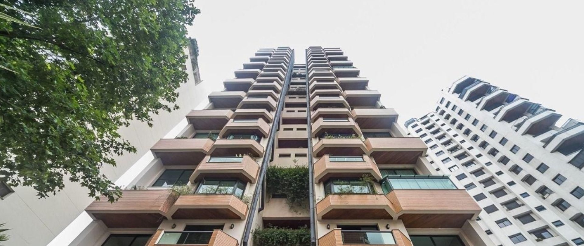 black and brown leather padded tub sofa