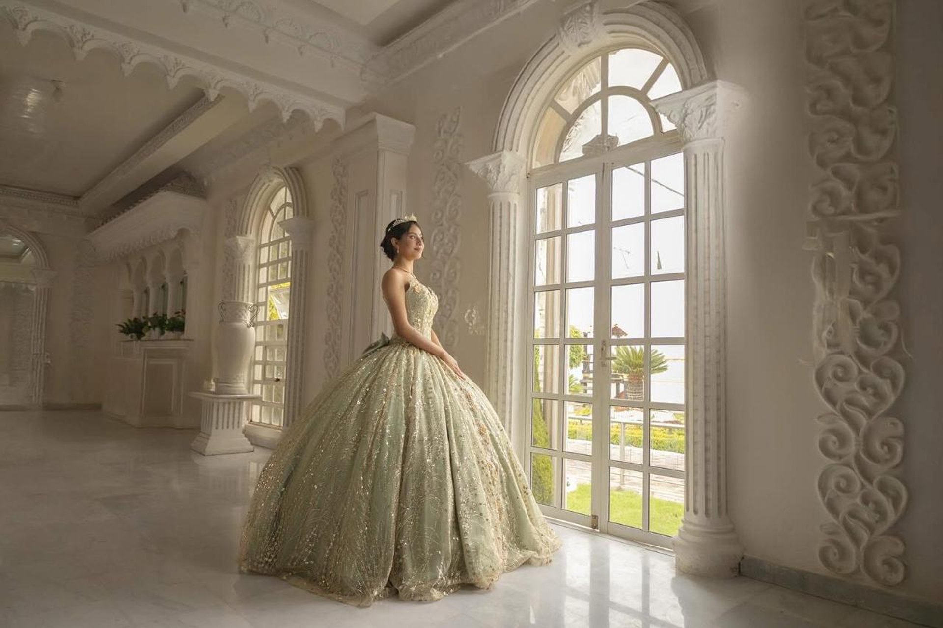a bride and groom walking on a hill