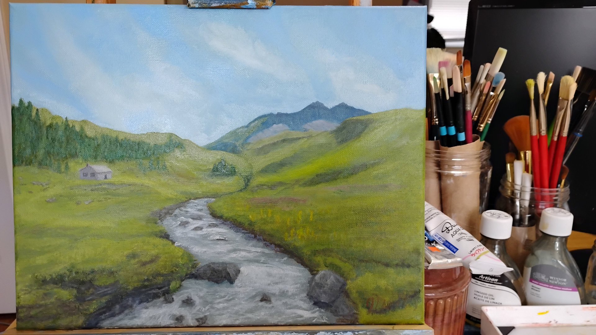 person wearing grey knit sweater