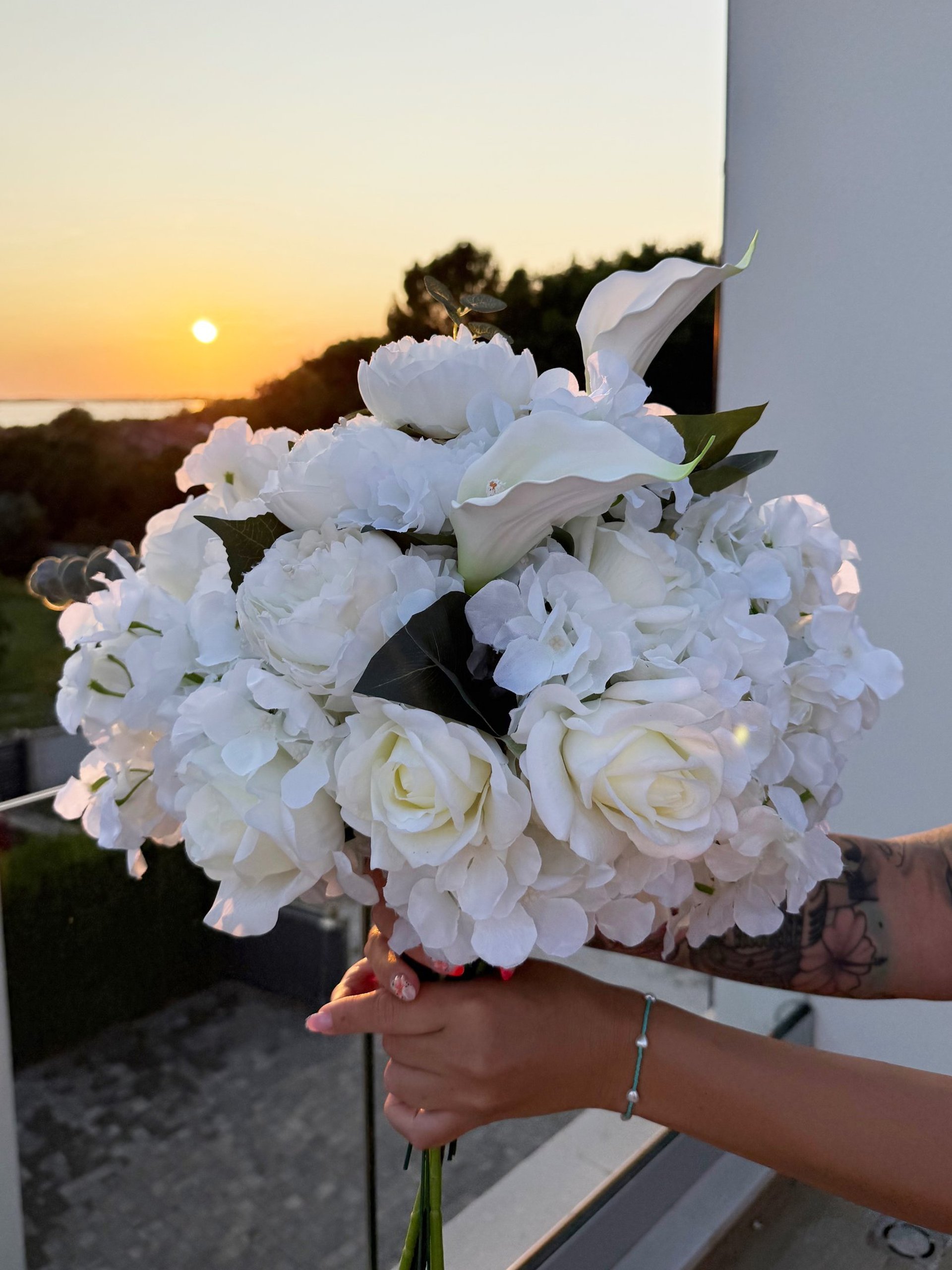 an abstract photo of a curved building with a blue sky in the background