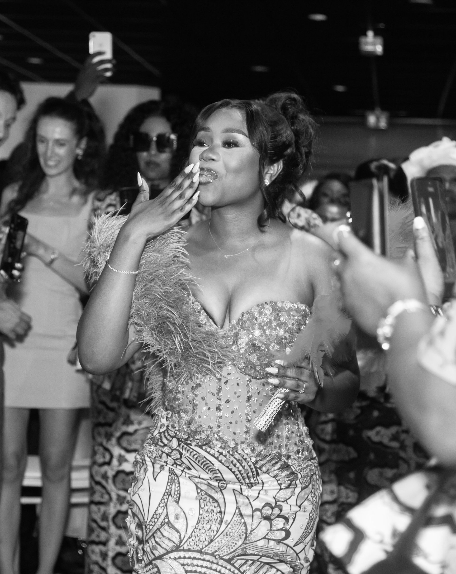 an abstract photo of a curved building with a blue sky in the background