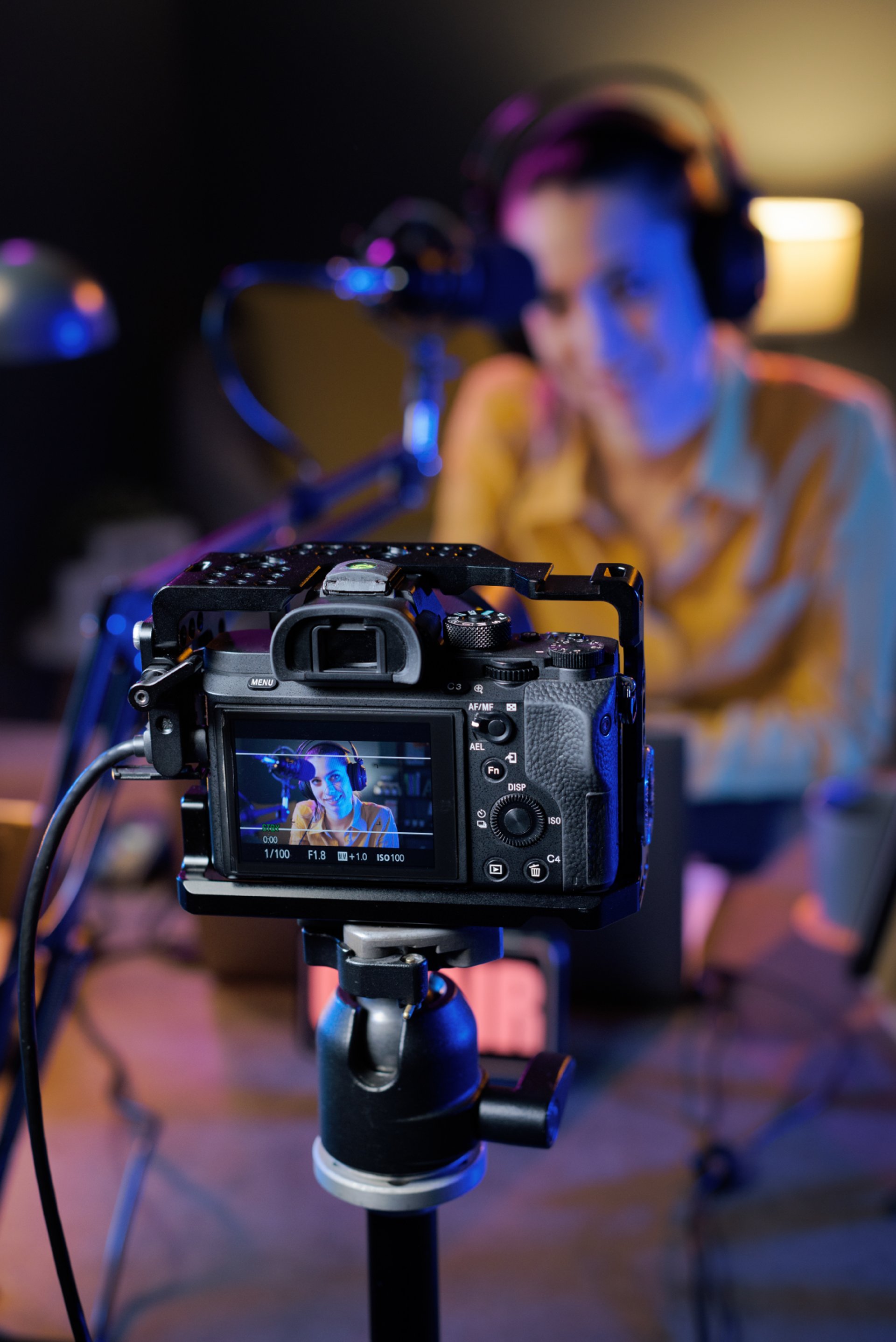 an abstract photo of a curved building with a blue sky in the background