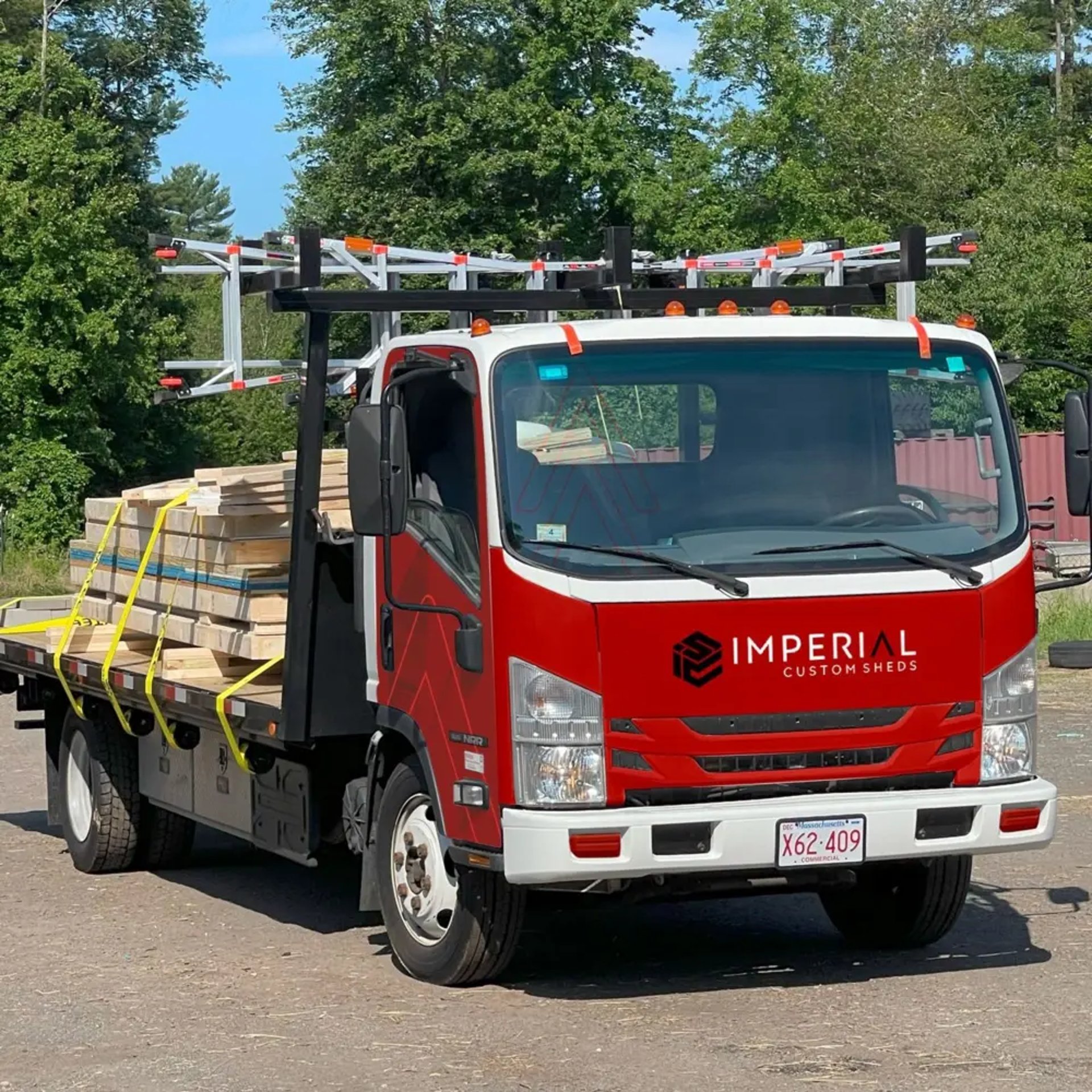 Imperial Custom Sheds delivery truck on the way to on-site shed installation