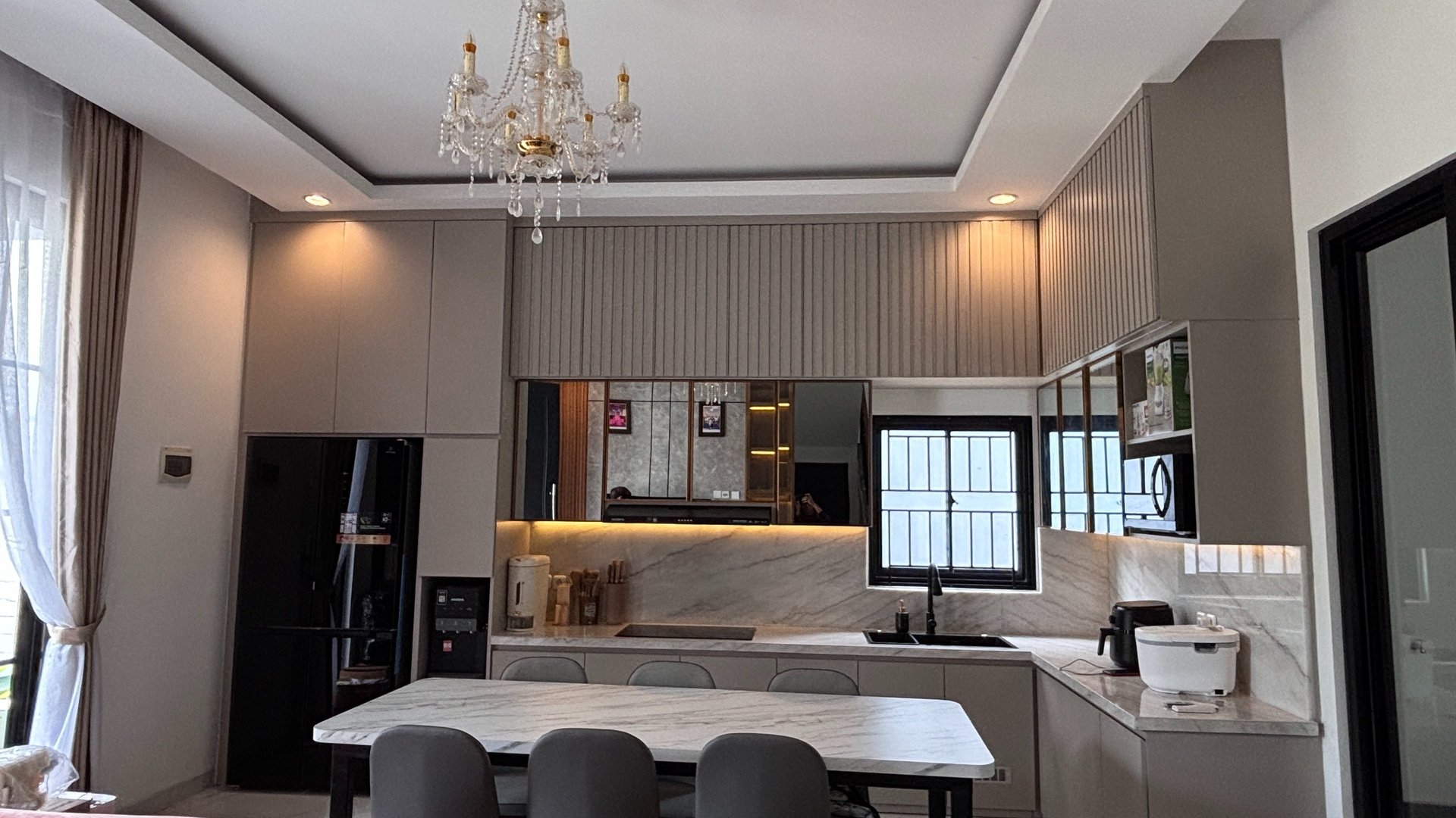woman wearing yellow long-sleeved dress under white clouds and blue sky during daytime