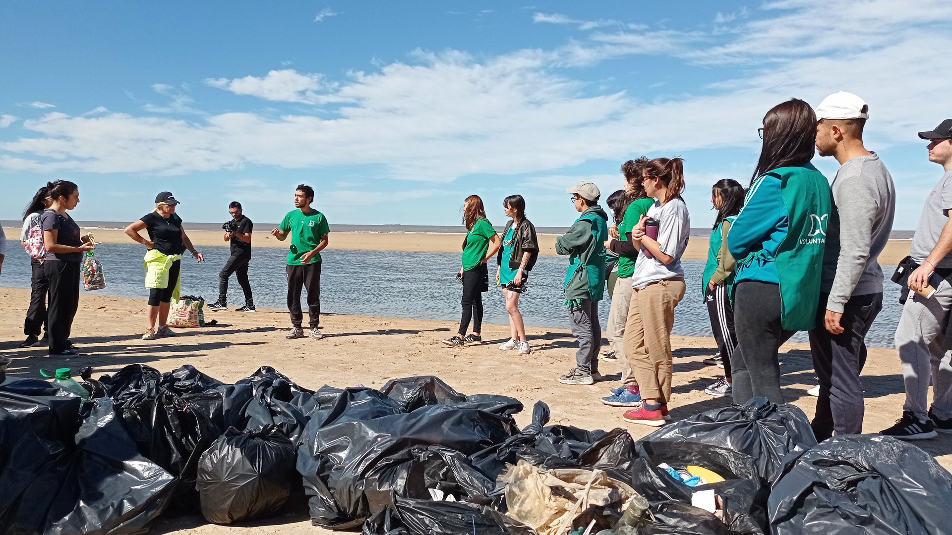 an abstract photo of a curved building with a blue sky in the background