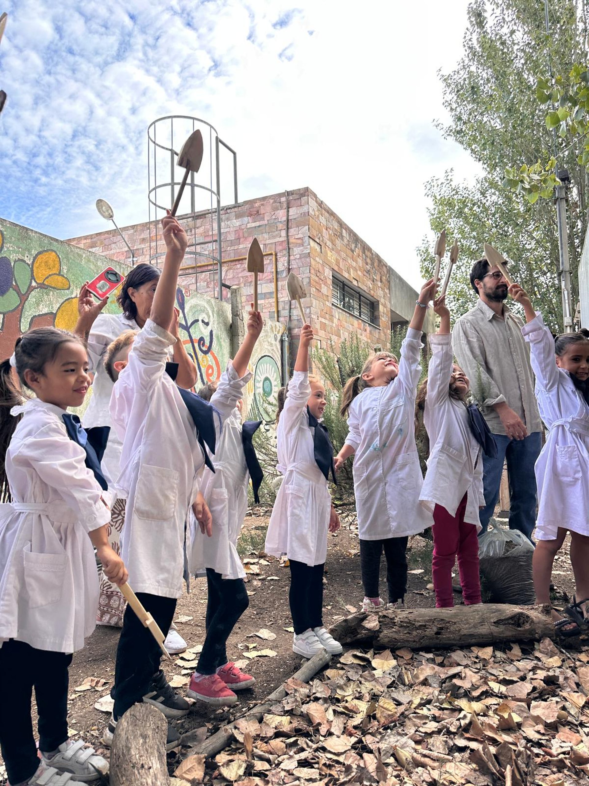 an abstract photo of a curved building with a blue sky in the background