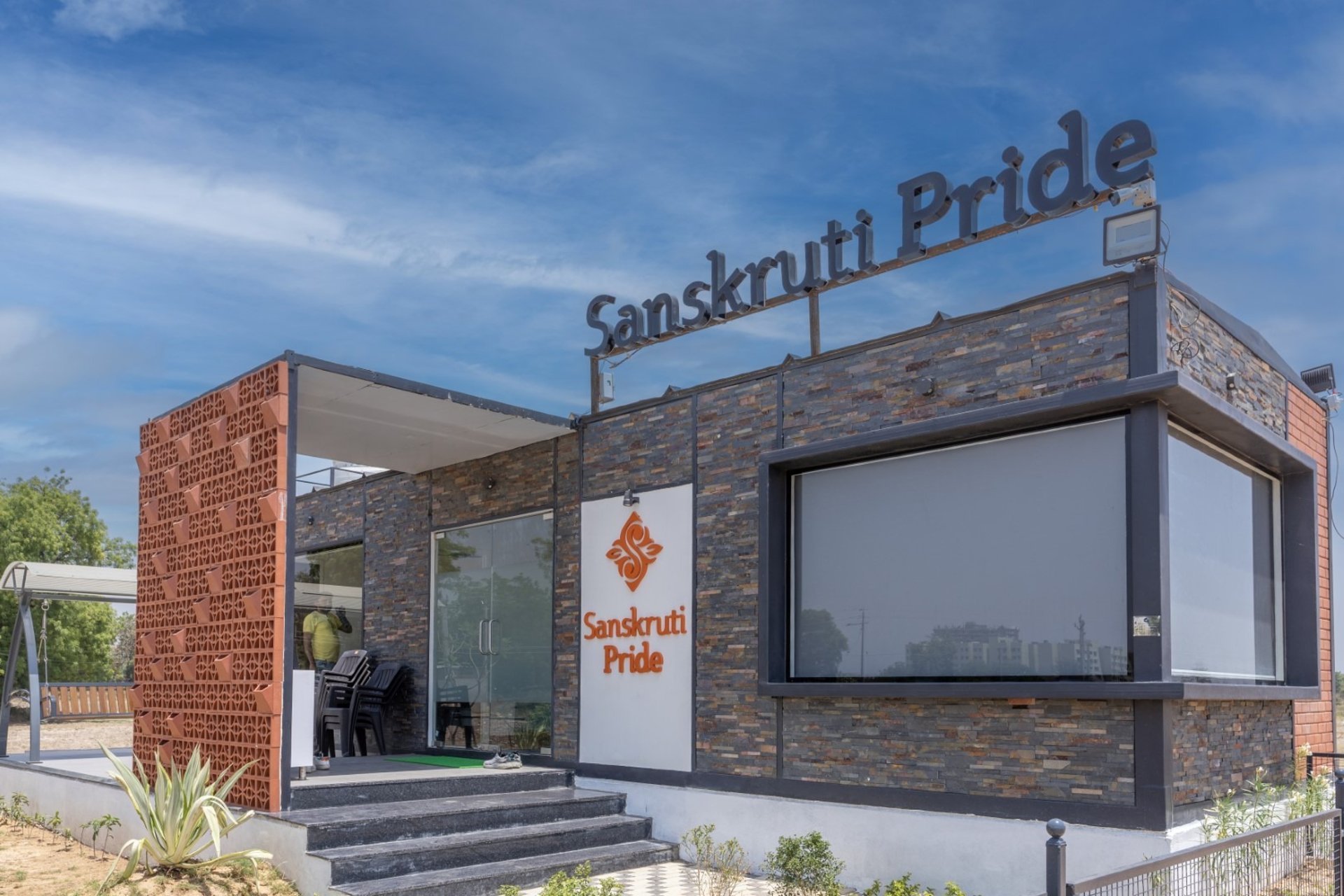 woman wearing yellow long-sleeved dress under white clouds and blue sky during daytime