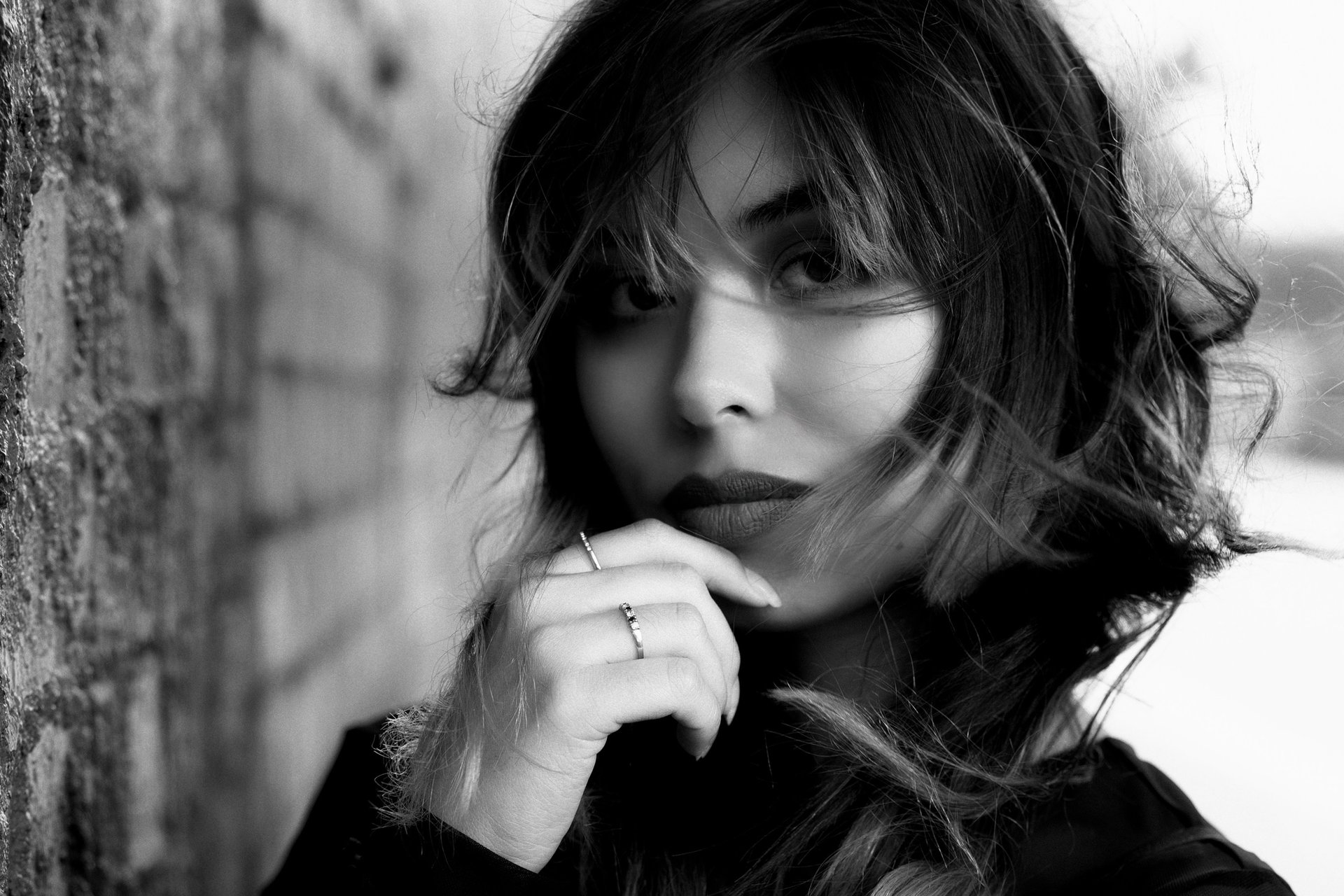 black and brown leather padded tub sofa