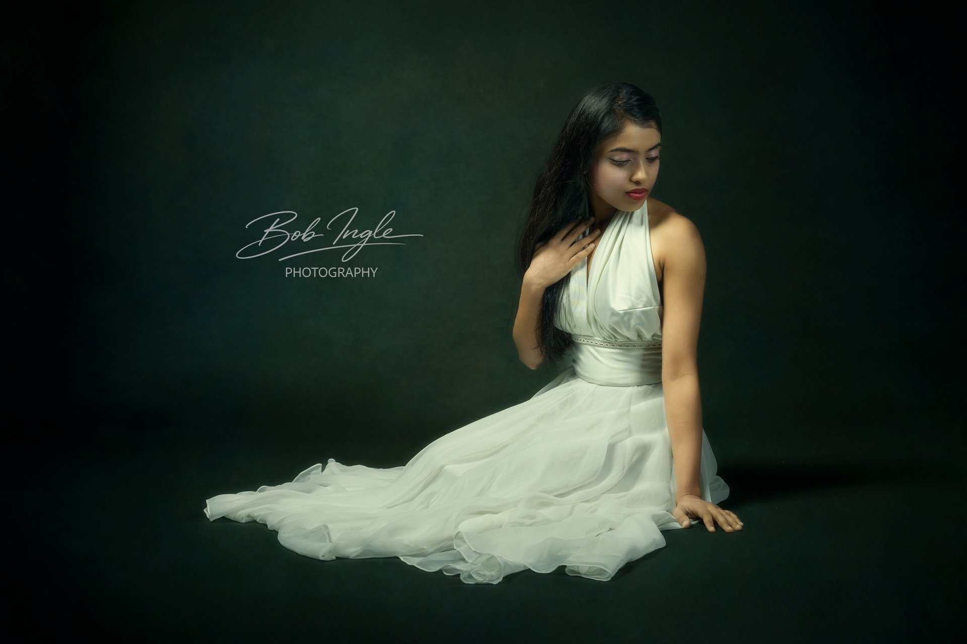 black and brown leather padded tub sofa