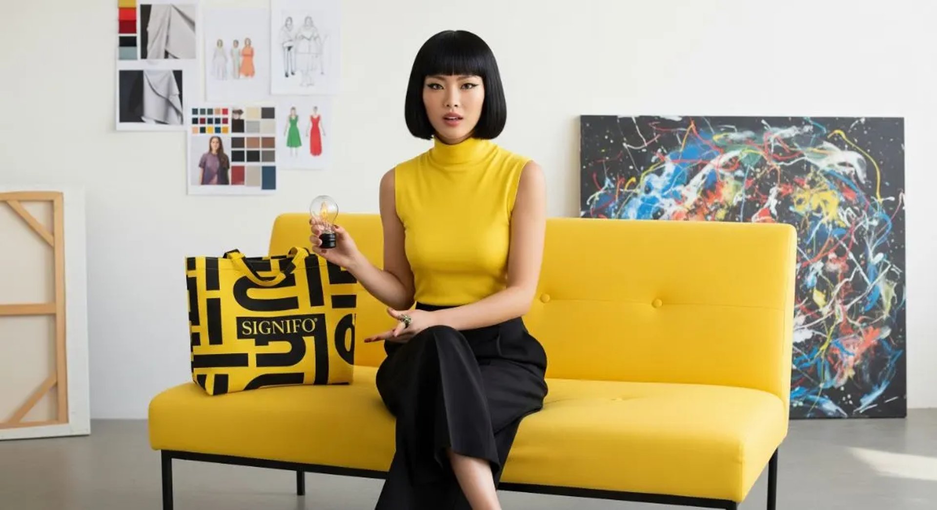 Model wanita dengan hasil aplikasi produk dari kain kanvas polyester SIGNIFO warna Kuning Muda