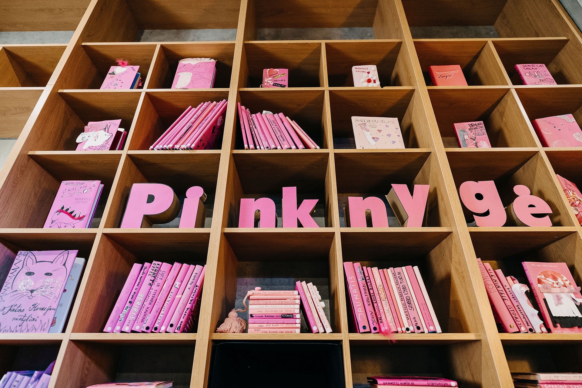 woman wearing yellow long-sleeved dress under white clouds and blue sky during daytime