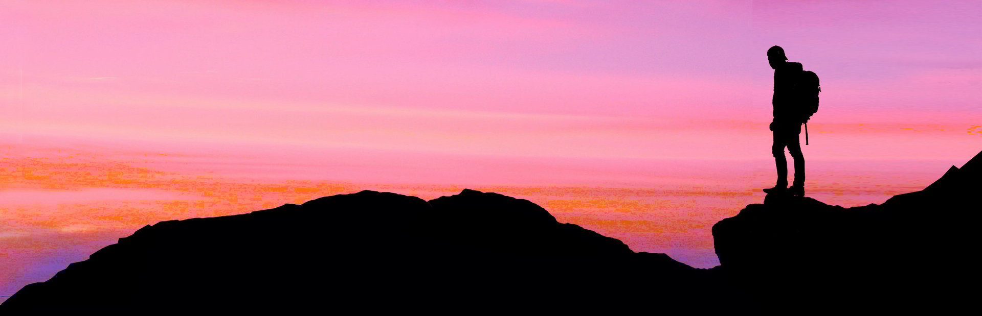 woman standing on mountain