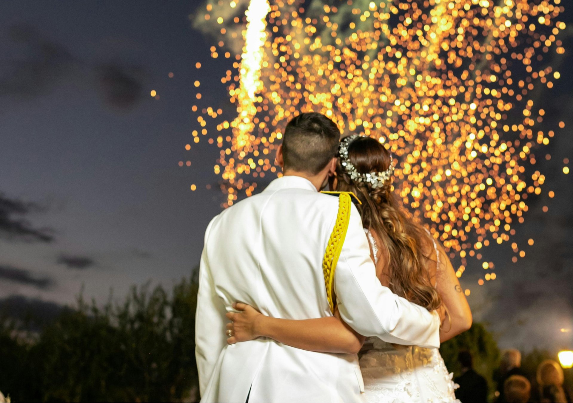 man and woman in wedding dress walking on brown grass field during daytime