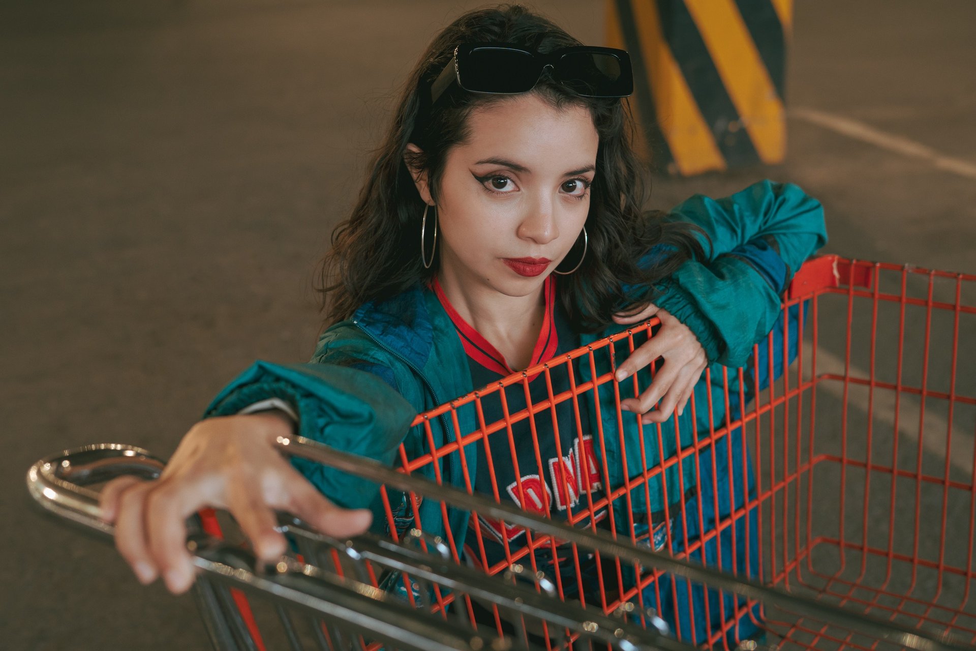 an abstract photo of a curved building with a blue sky in the background