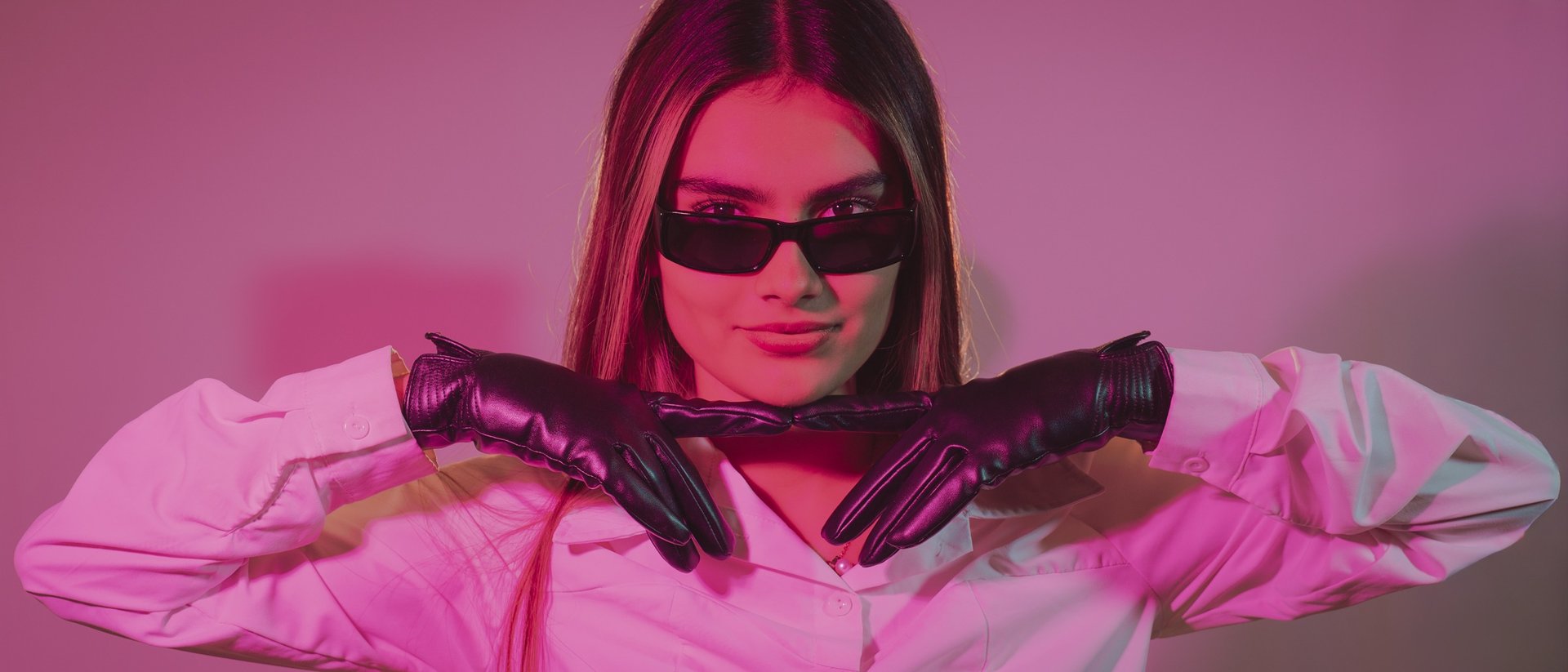 an abstract photo of a curved building with a blue sky in the background
