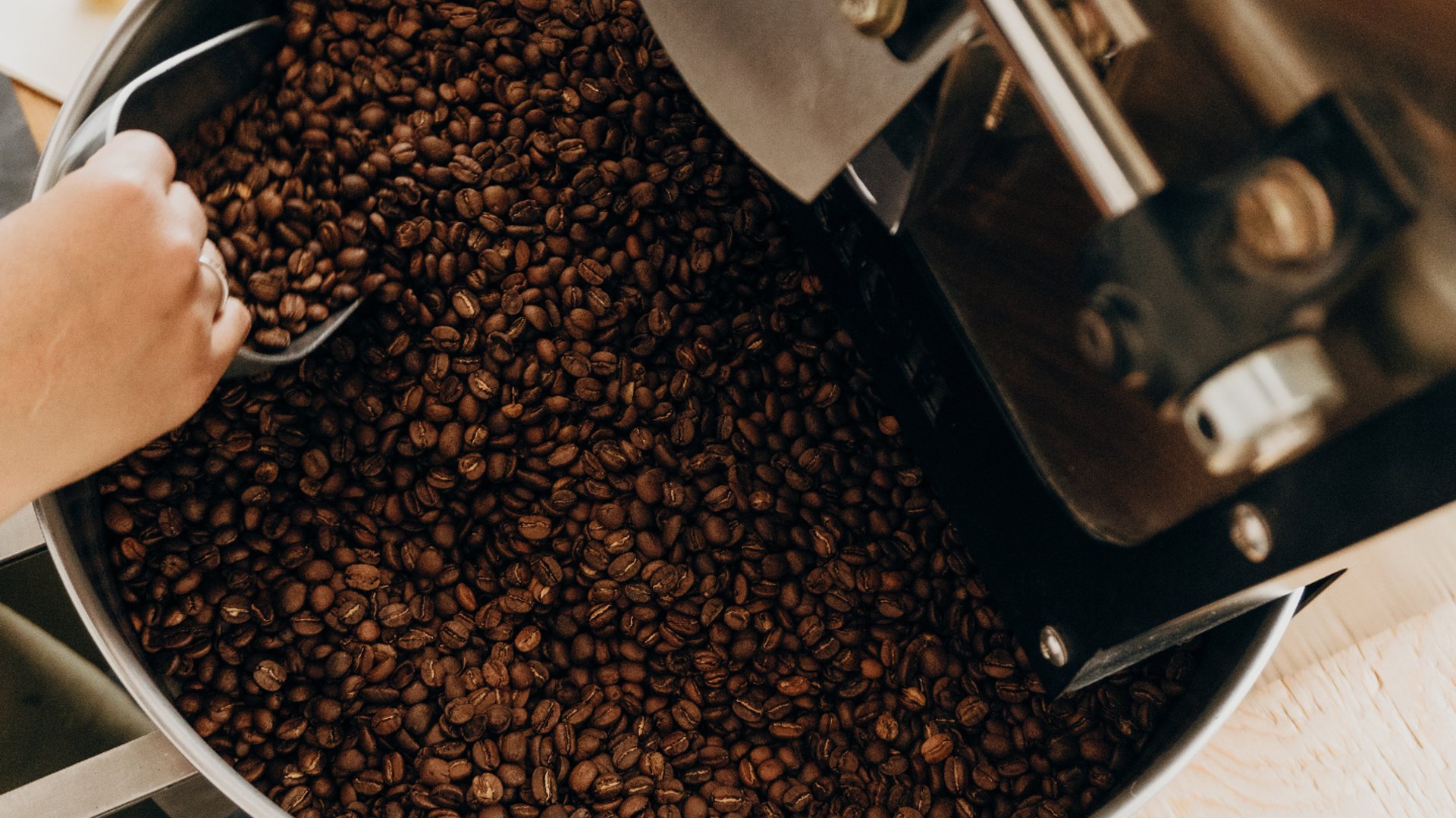 an abstract photo of a curved building with a blue sky in the background