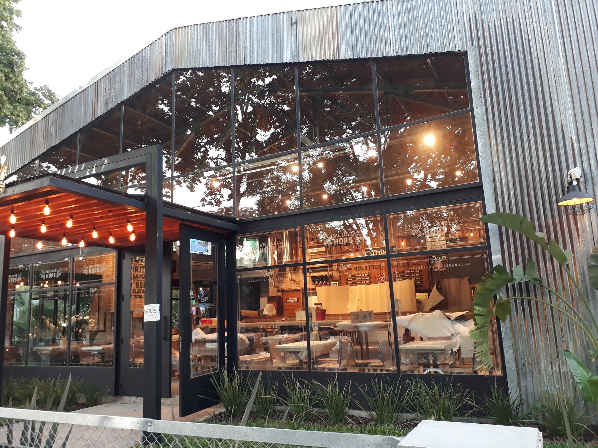 black and brown leather padded tub sofa