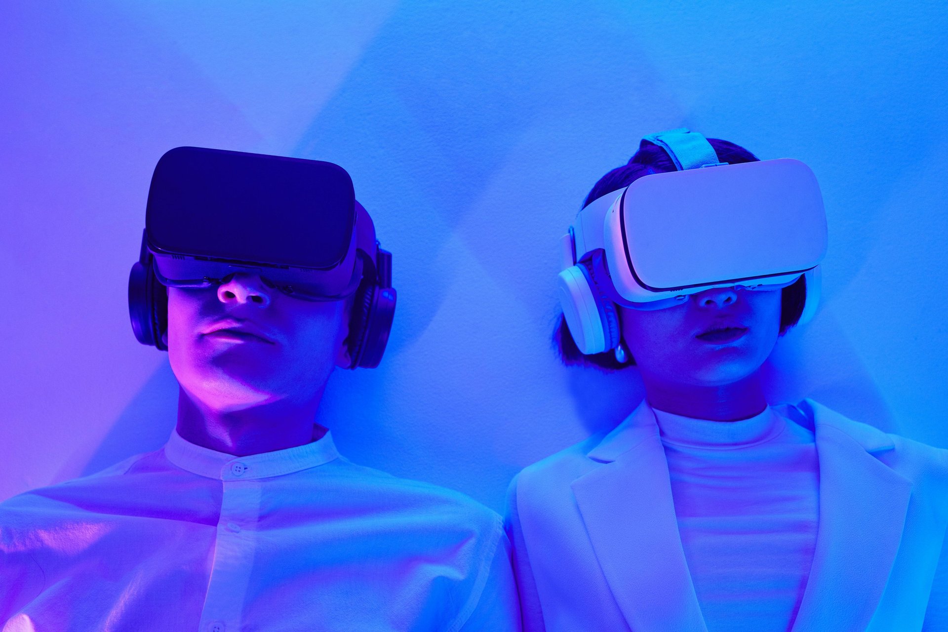 photo of girl laying left hand on white digital robot