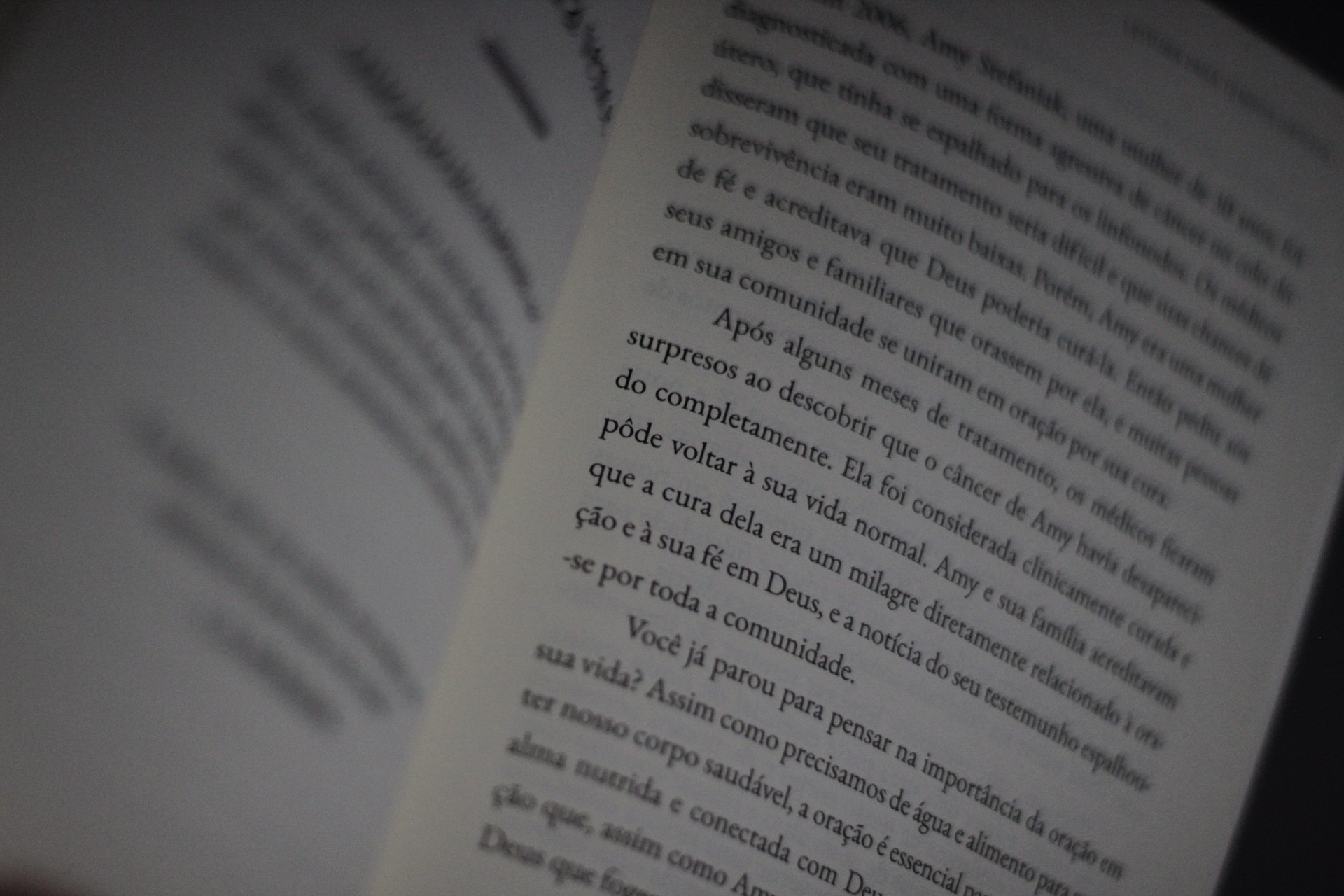 person reading book in library