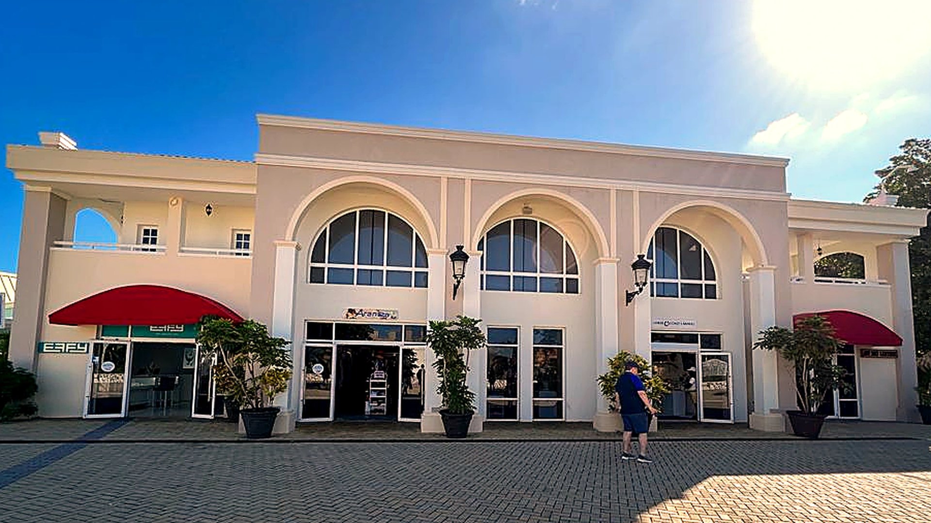 person wearing grey knit sweater