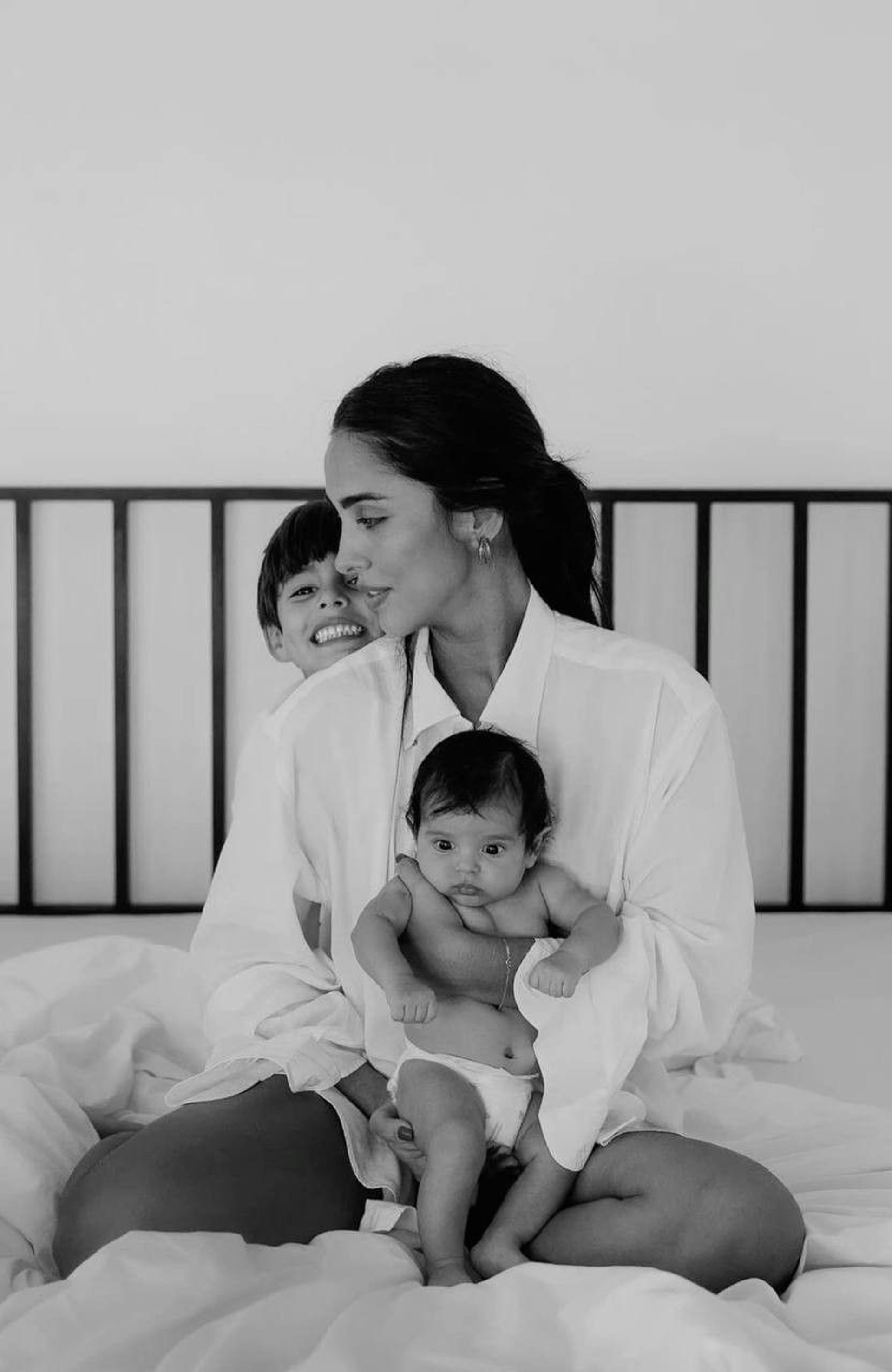 an abstract photo of a curved building with a blue sky in the background